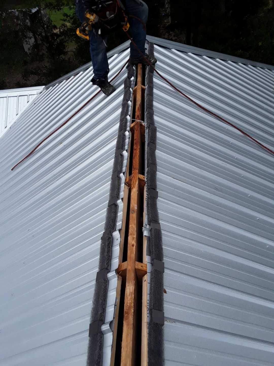 Residential Roofing Installation using Metal roofing by American Roofing & Construction LLC