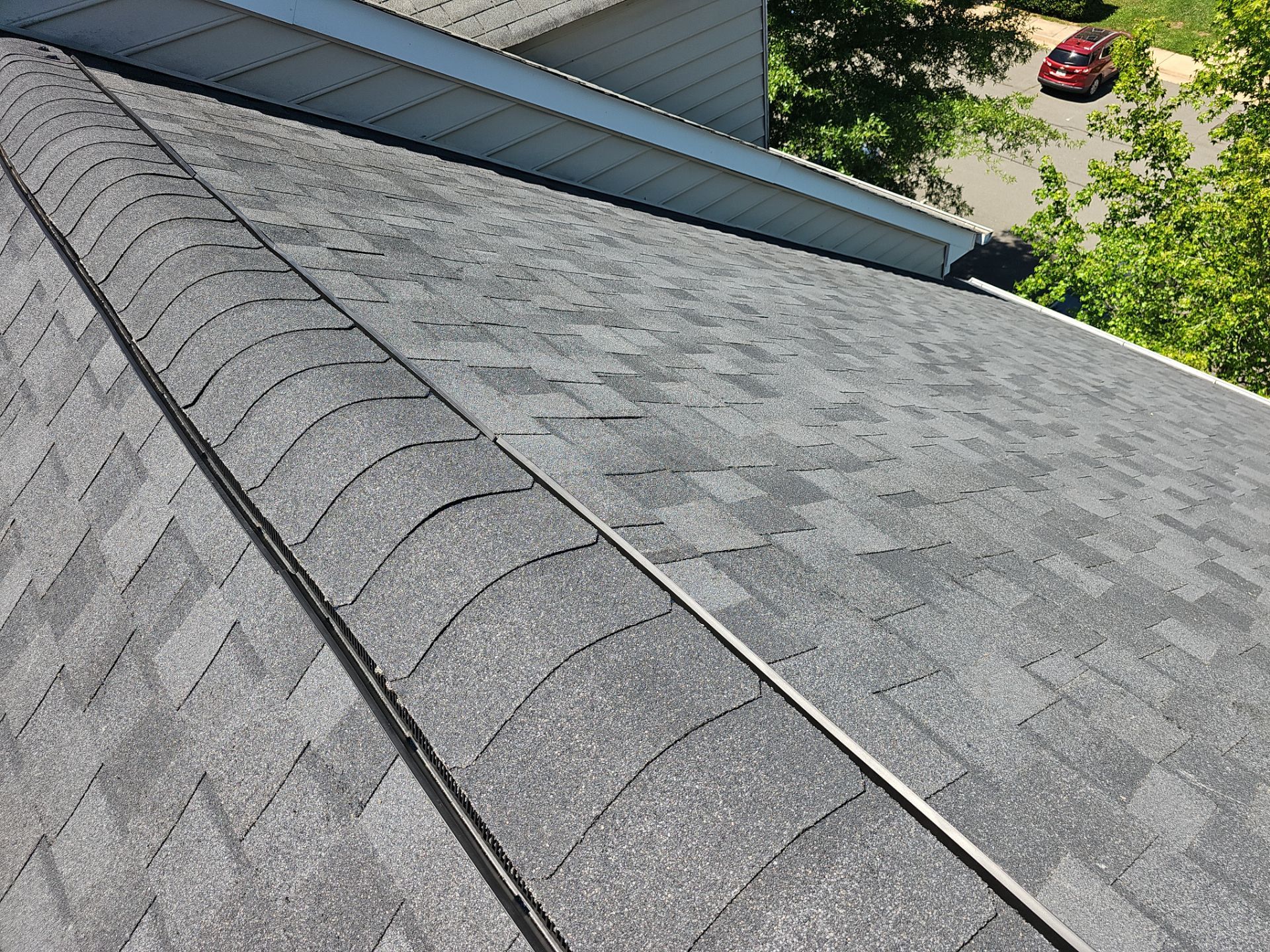 Roof Replacement - Moire Black by Winchester Roofing