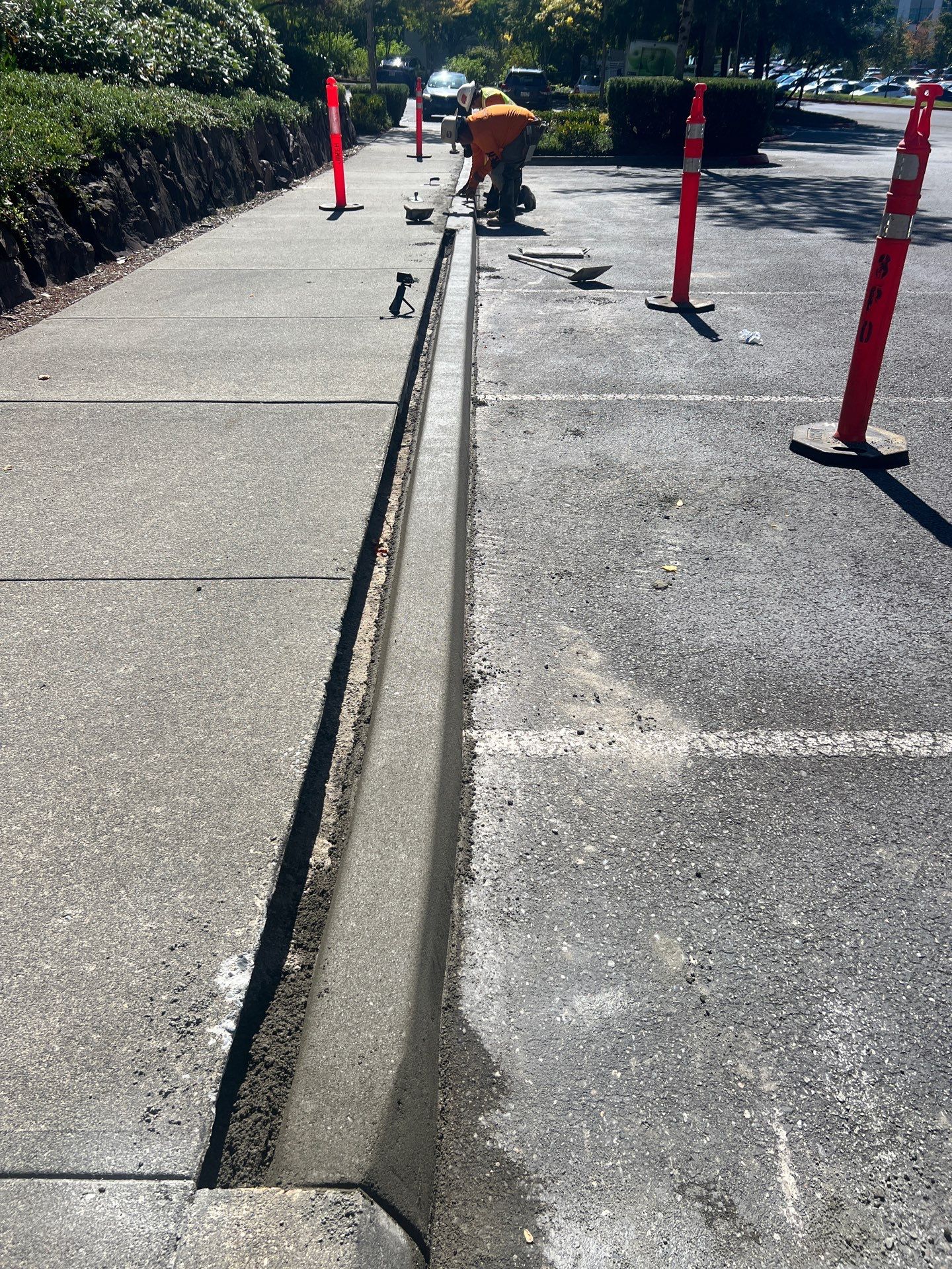 Kidder Matthews | Parking Lot Sealcoating & Striping with Concrete Curb & Patch Repairs  by Jireh Asphalt & Concrete Inc 