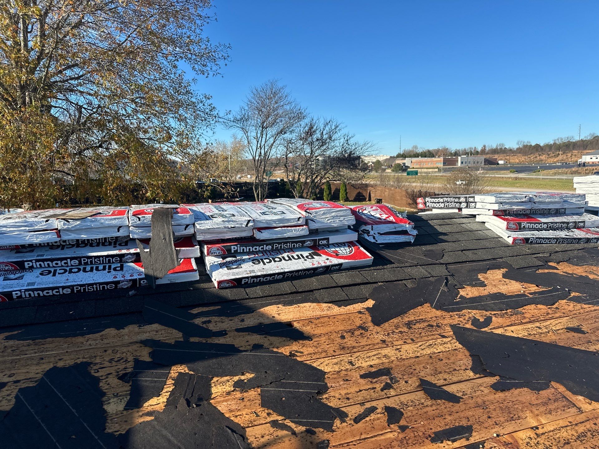 Residential Roofing & Downspouts Install  by Titan Commercial & Residential Roofing 