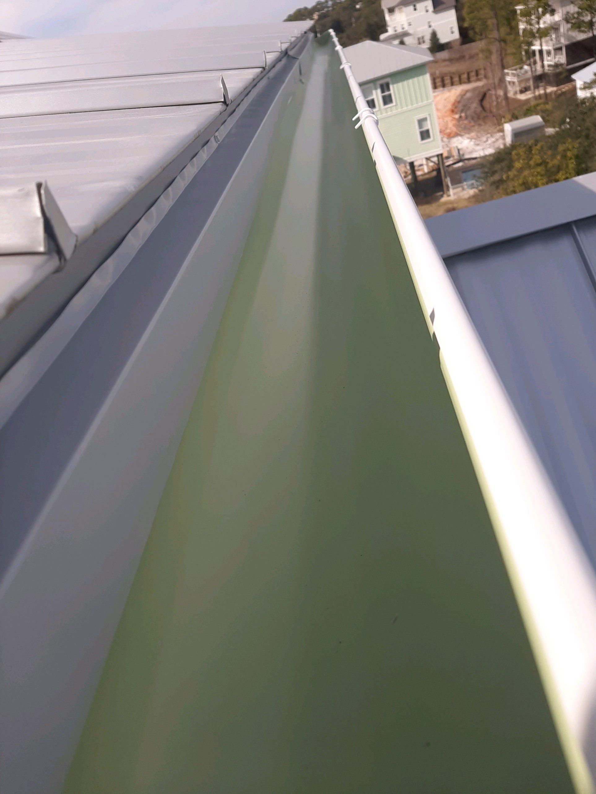 Gutter Installation Using 6 Inch Seamless Aluminum Gutters by Gutter Professors