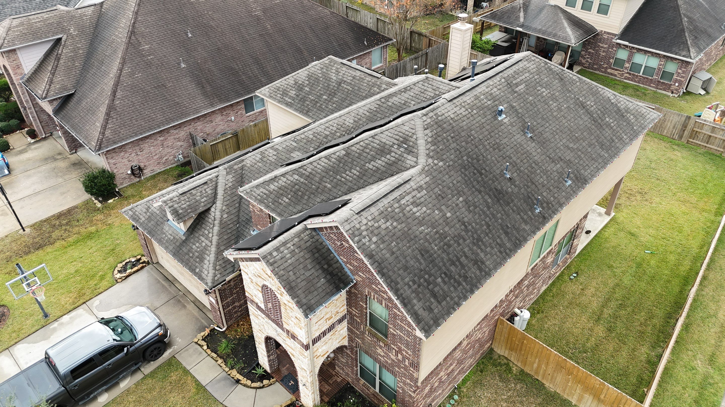Roof Replacement with Solar Detach & Reset using IKO Dynasty by Core Four Roofing