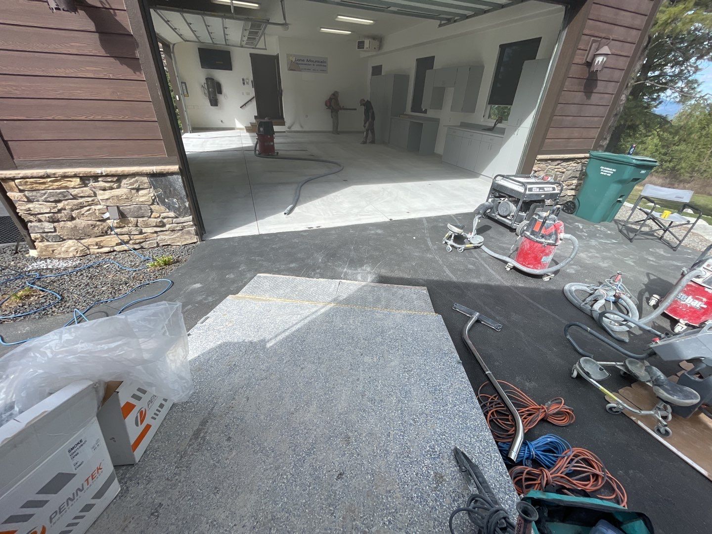 Garage Transformation using Smoke and the Penntek Evolution System by Croc Coatings, LLC