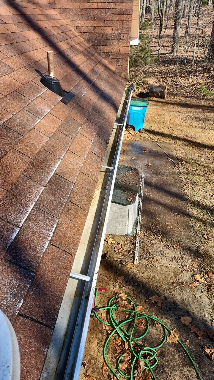 Gutter and Roof cleaning using cleaner by G&H Home Tech Pros LLC