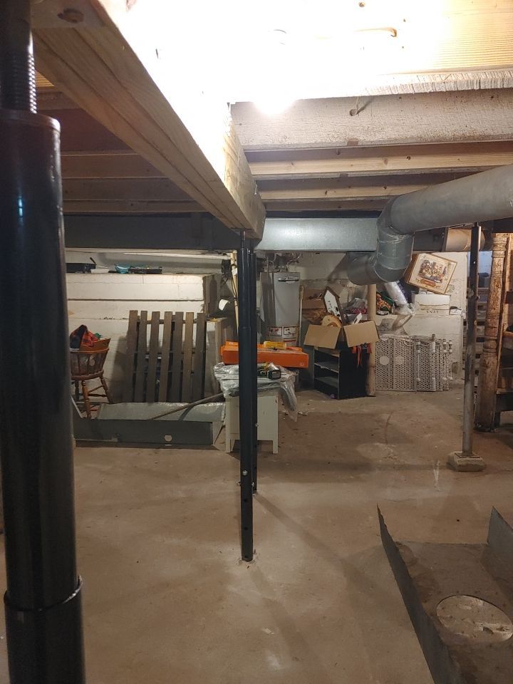 Structural Wood Reinforcement using Structural Wood and Steel Reinforcements (Main Floor Joist) by Toledo Basement Repair