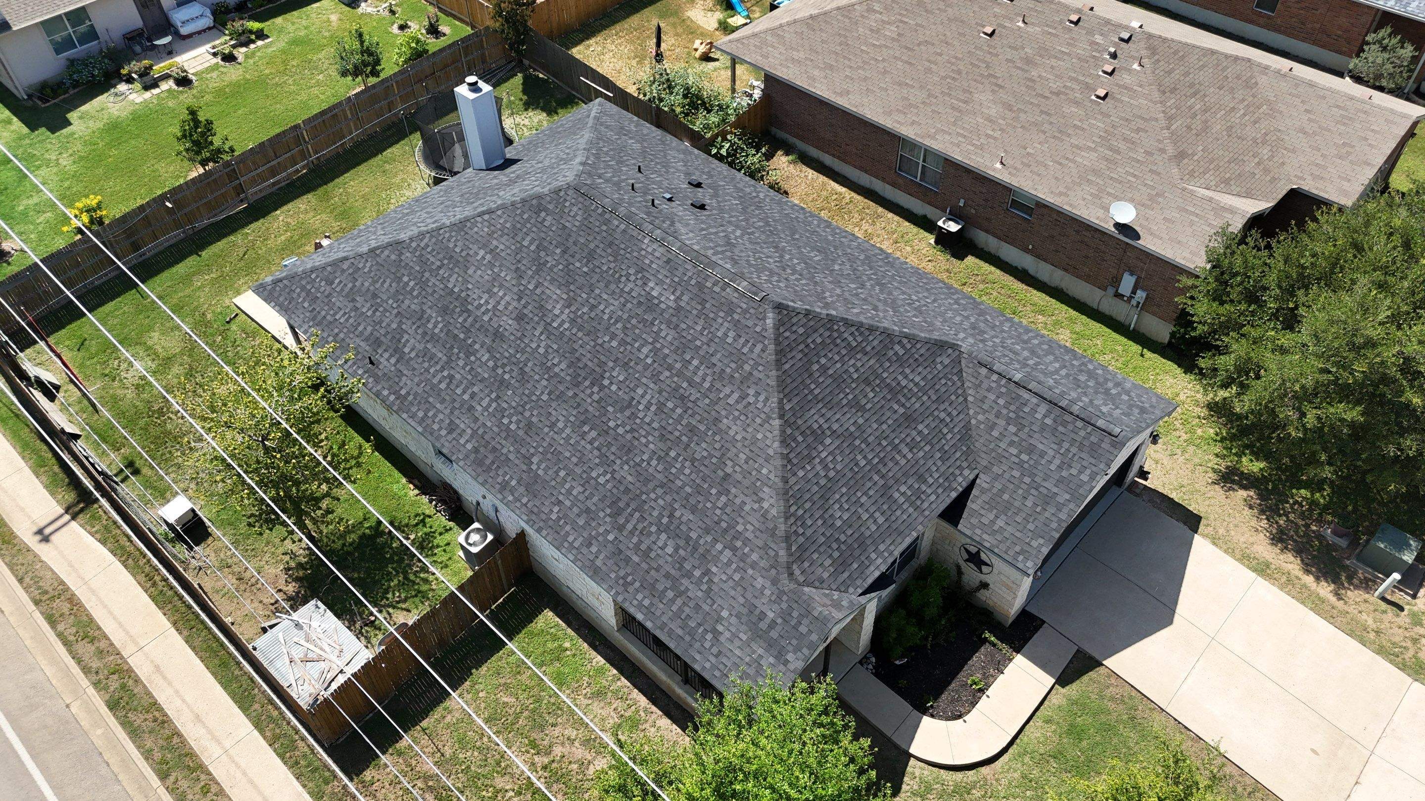 Granite Black Shingles by Perennial Roofing 