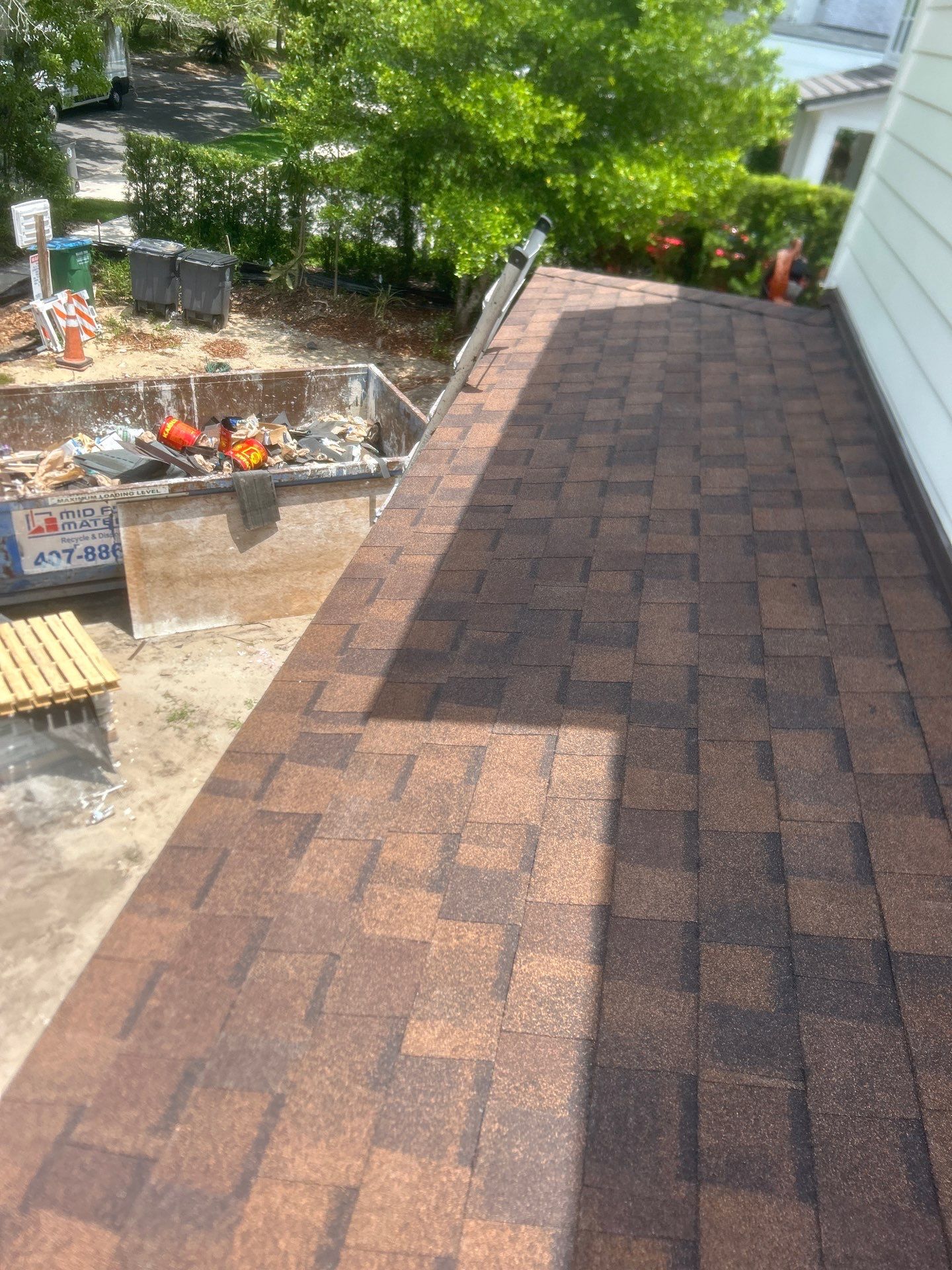 Residential Architectural Shingle Re-Roof Project in Winter Park by Tip Top Roofing Co., Inc.