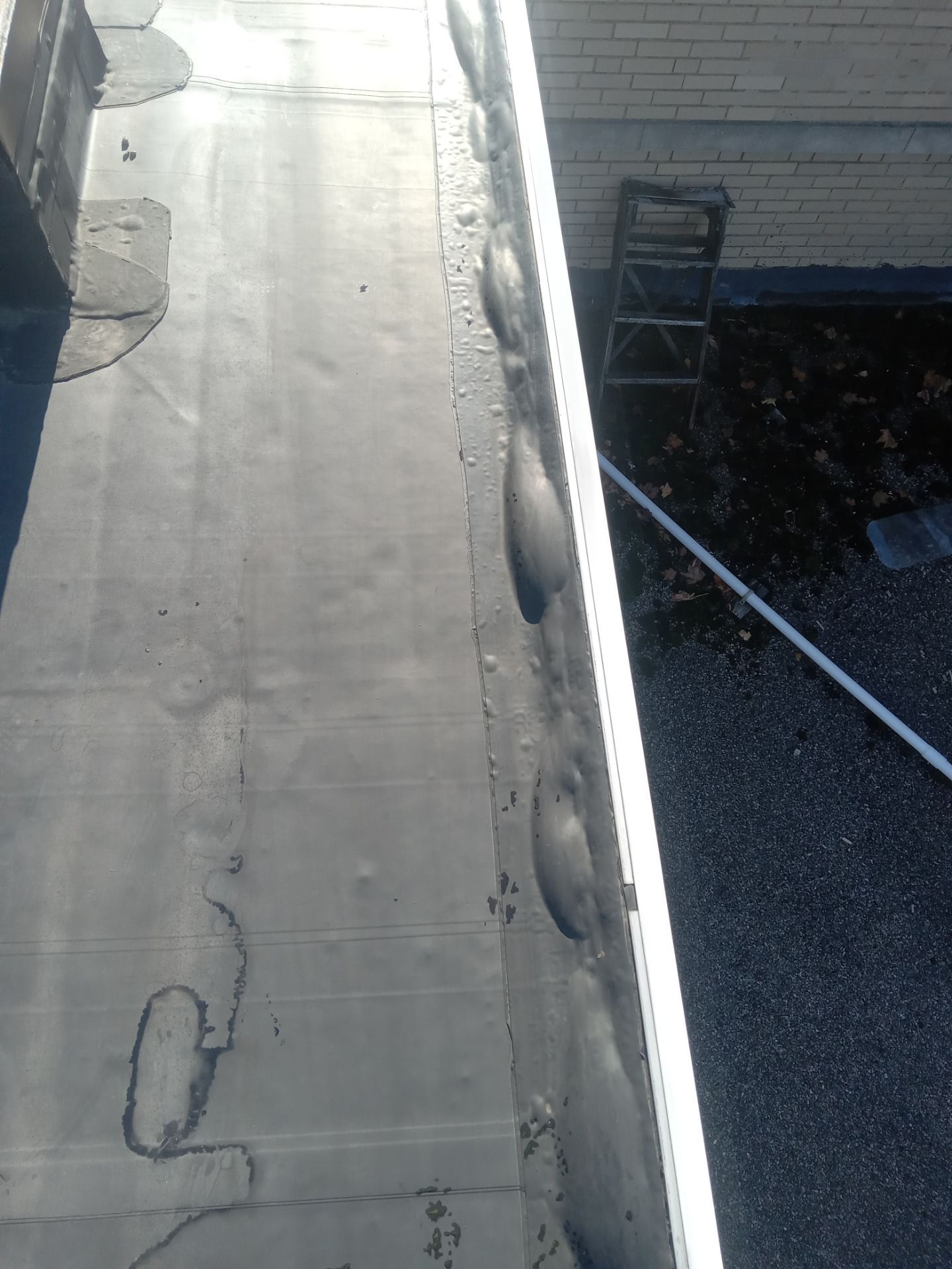 Commercial Roofing using Roof Replacement by Absolute Roofing and Construction