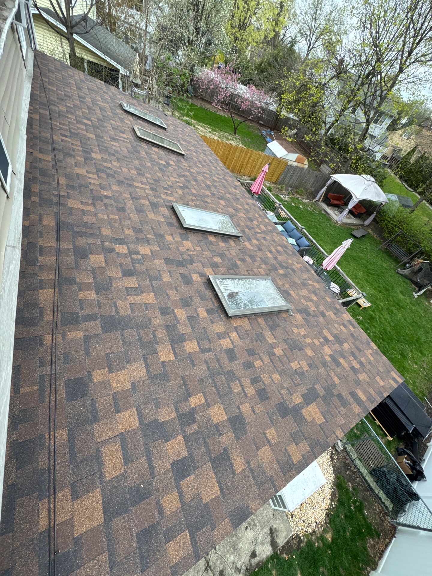 Burnt Sienna Shingles by Reimagine Roofing