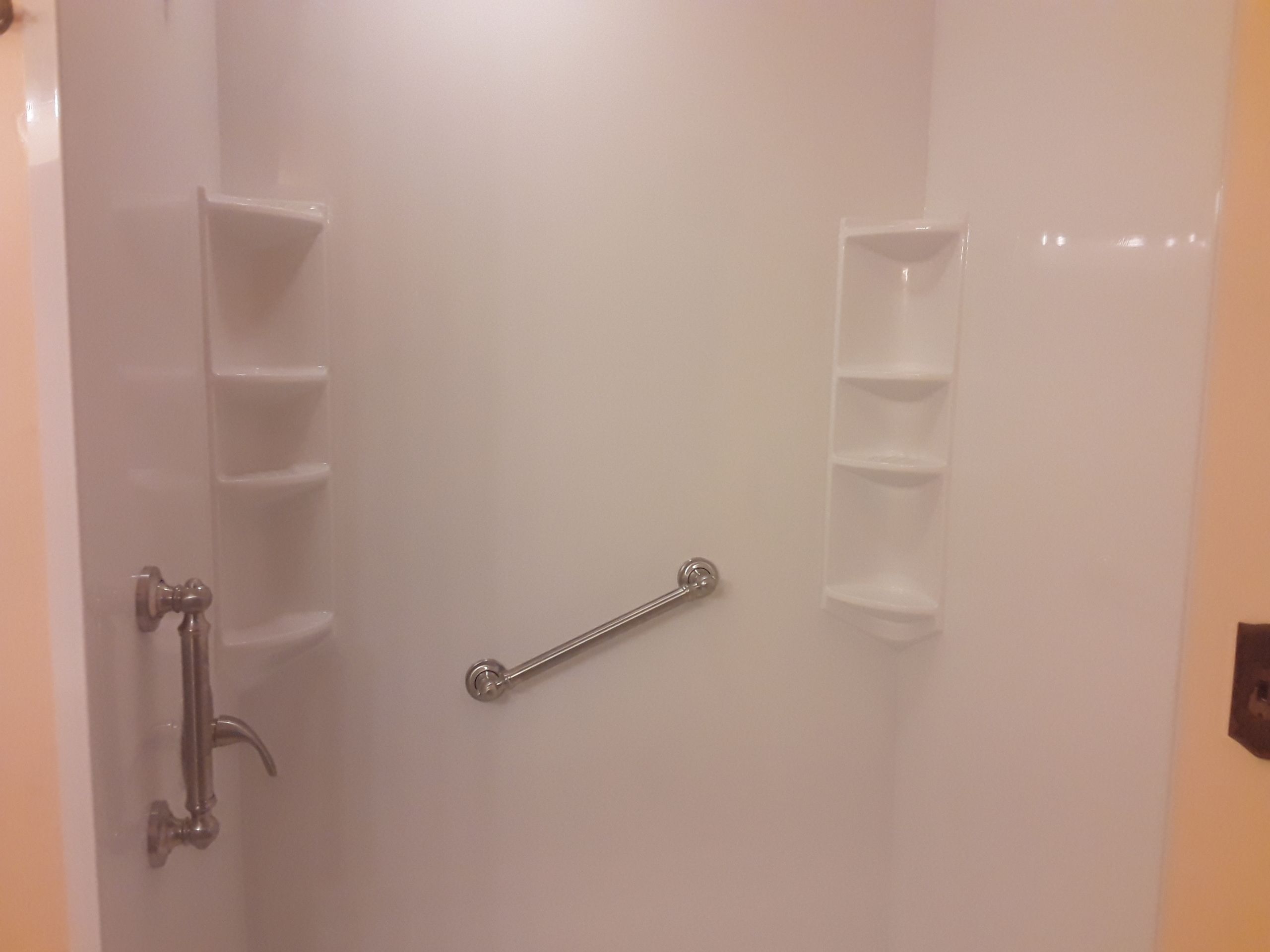 Tub to Shower Conversion using BCI Acrylic Shower System by Secure Construction Company Inc