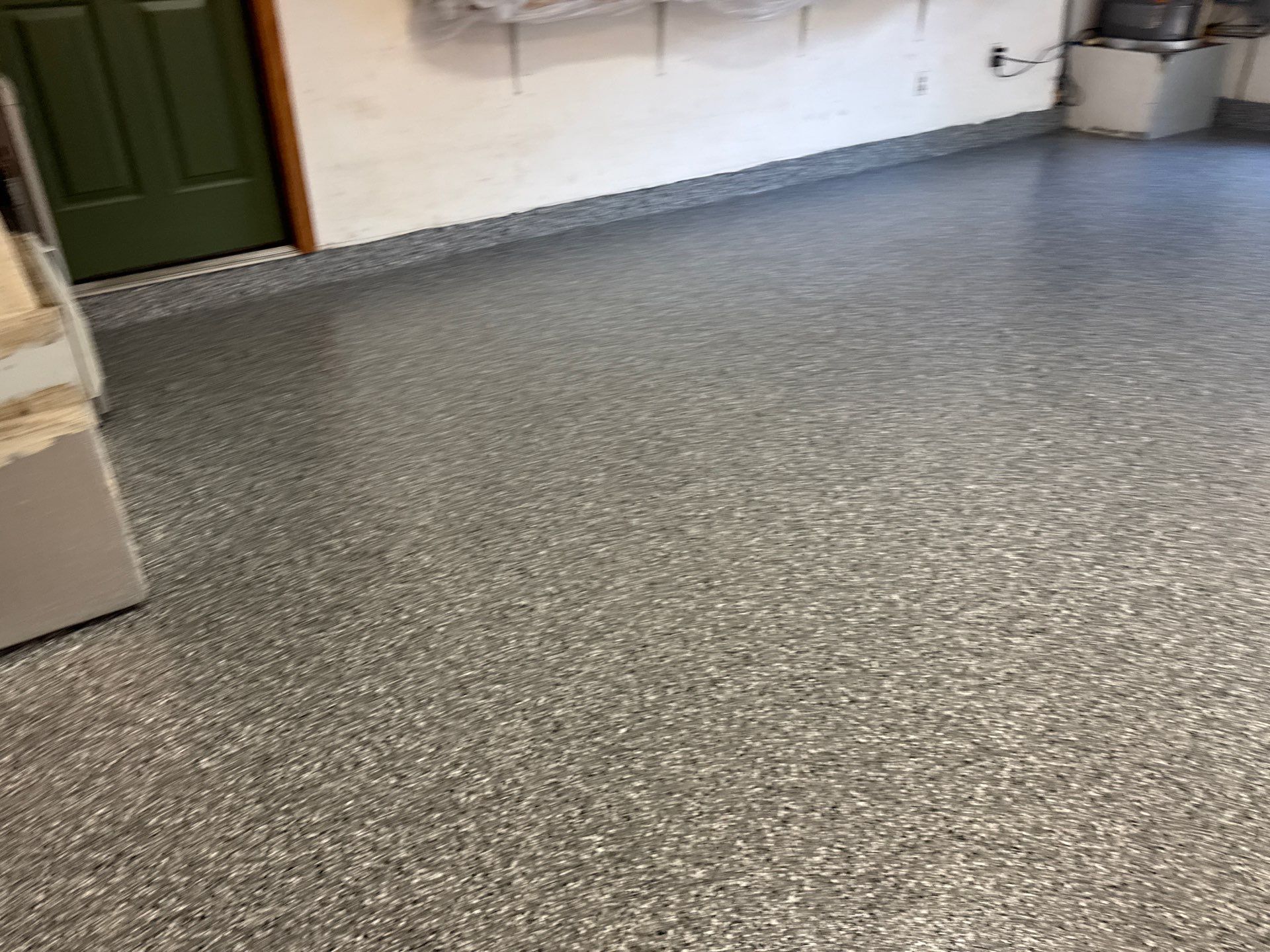 Garage in Gainesville, FL in Smoke by Cross Creek Concrete Coatings