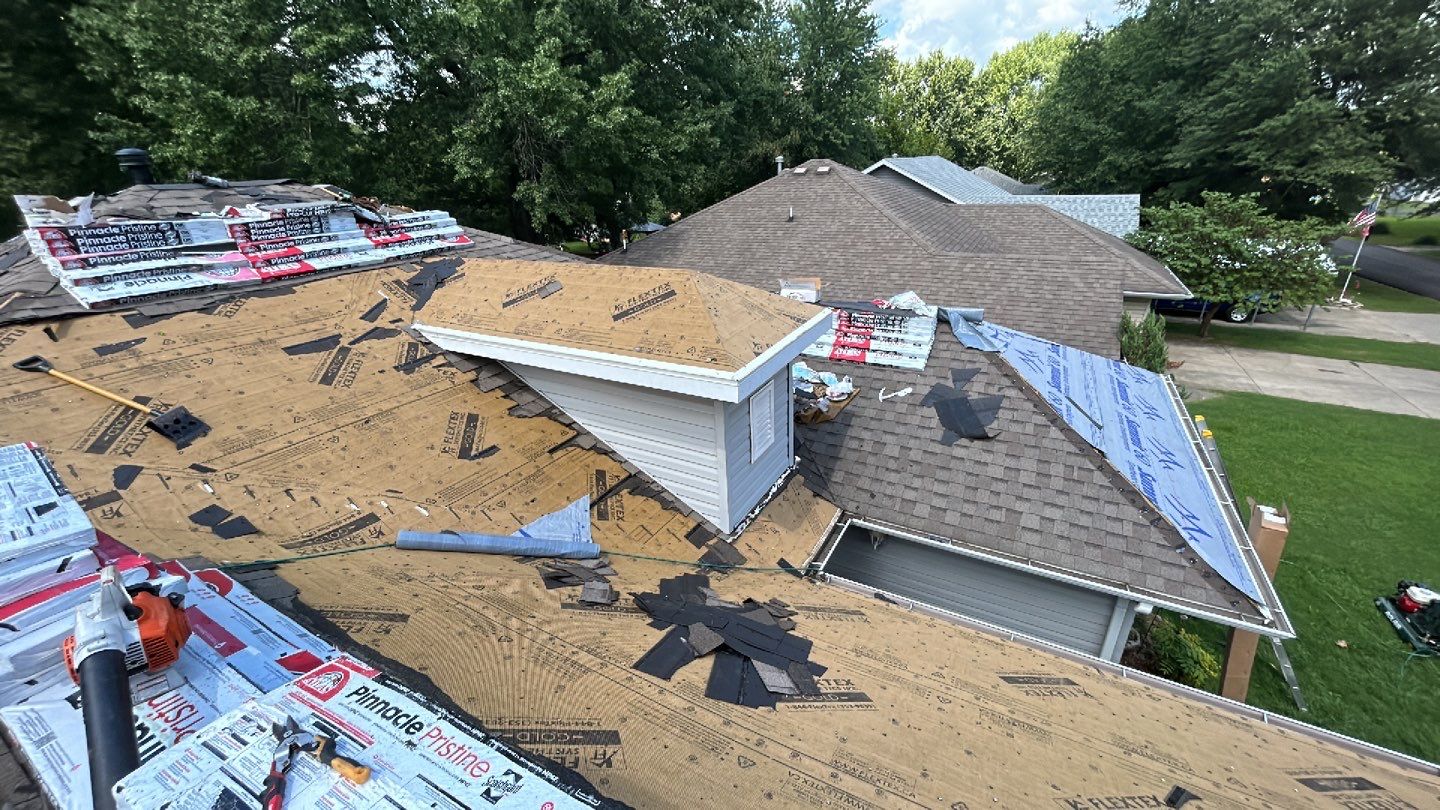 Residential Roof + Gutters & Downspouts Install  by Titan Commercial & Residential Roofing 