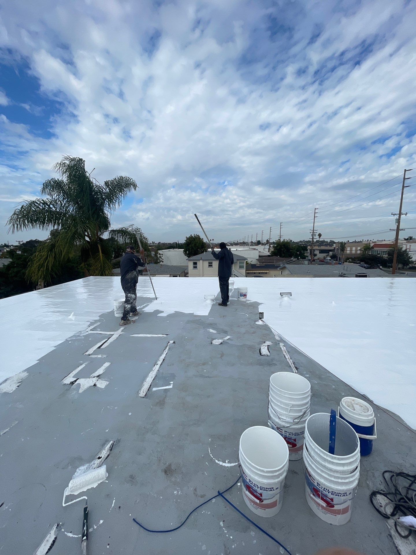 Silicone Membrane installation in LOMITA, CA. by Hull Brothers Roofing