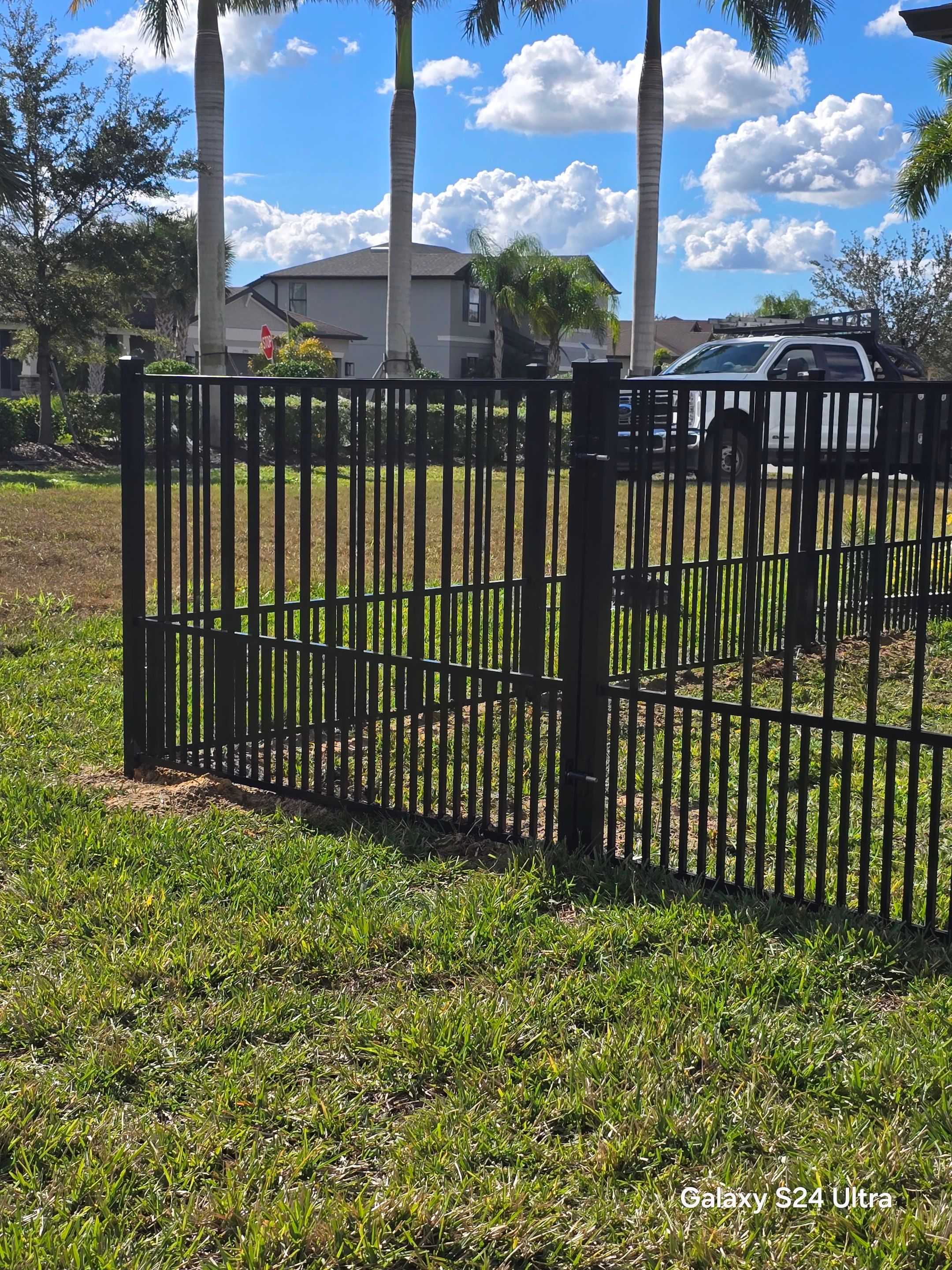 Puppy picket aluminum fence in North Port by True Fence LLC