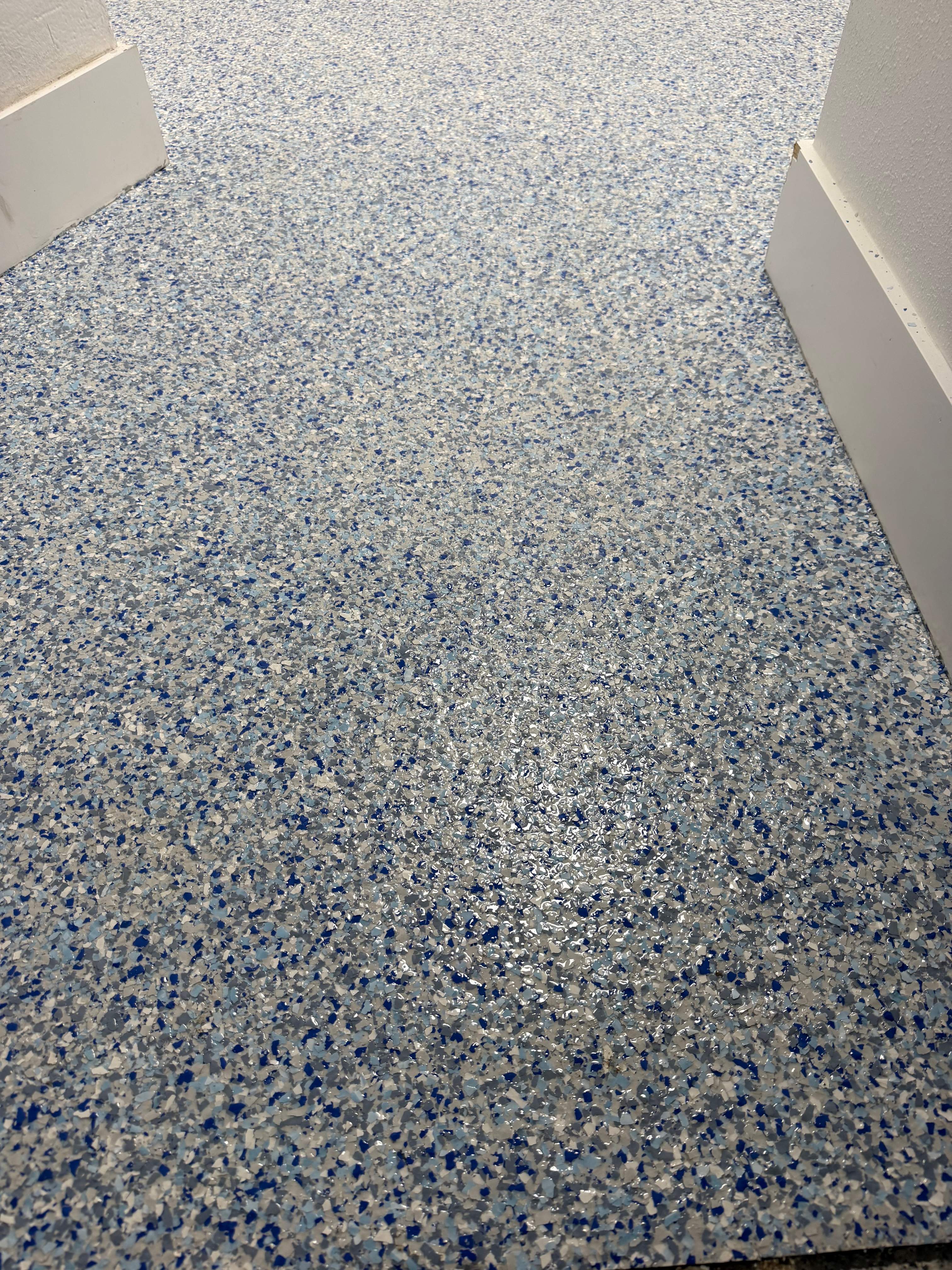 Commercial Restroom Renovation with Epoxy Flooring in Sarasota by Vertical General Contracting 
