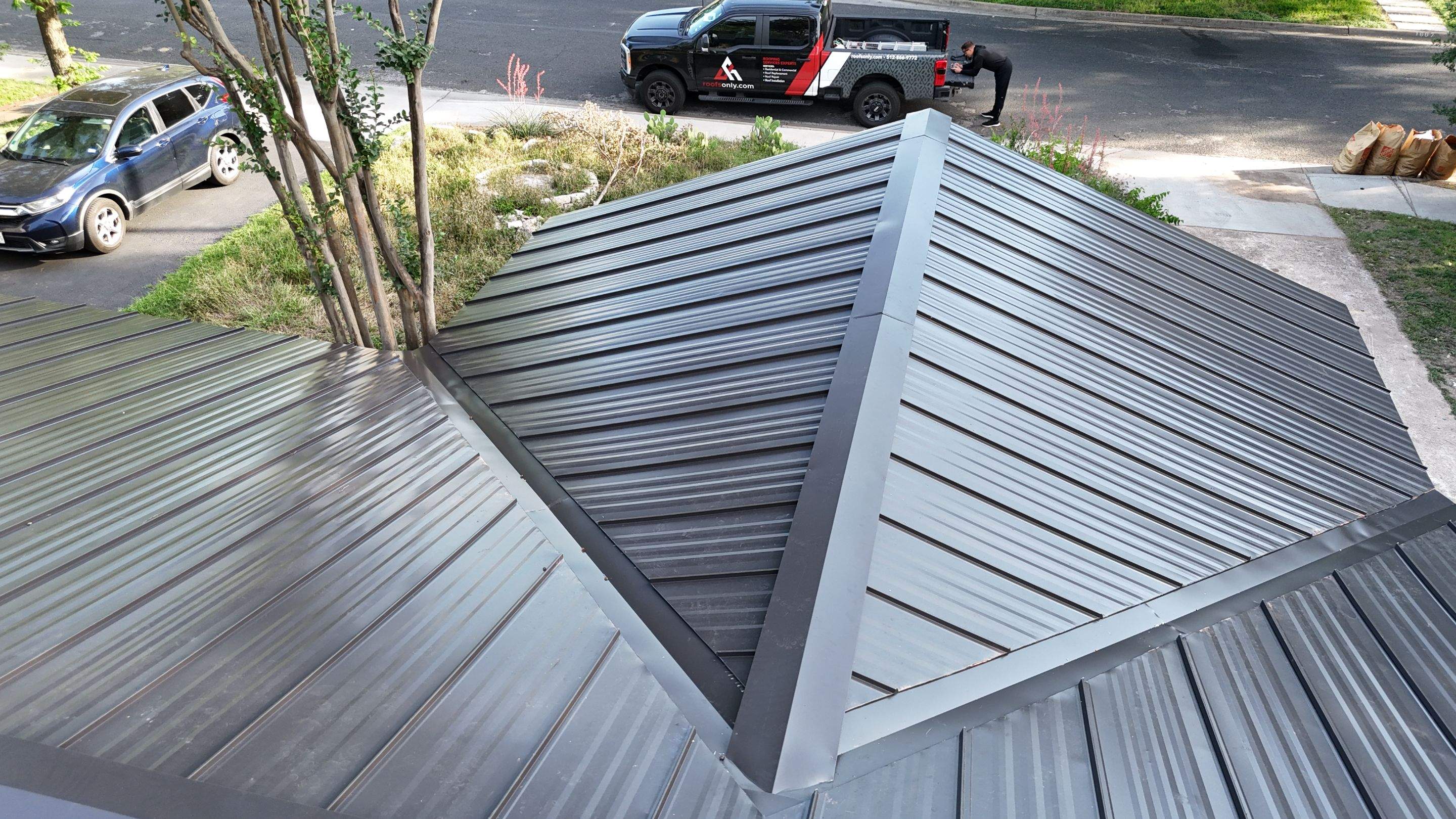 Dark Bronze - L&A Standing Seam with Striations by RoofsOnly.com