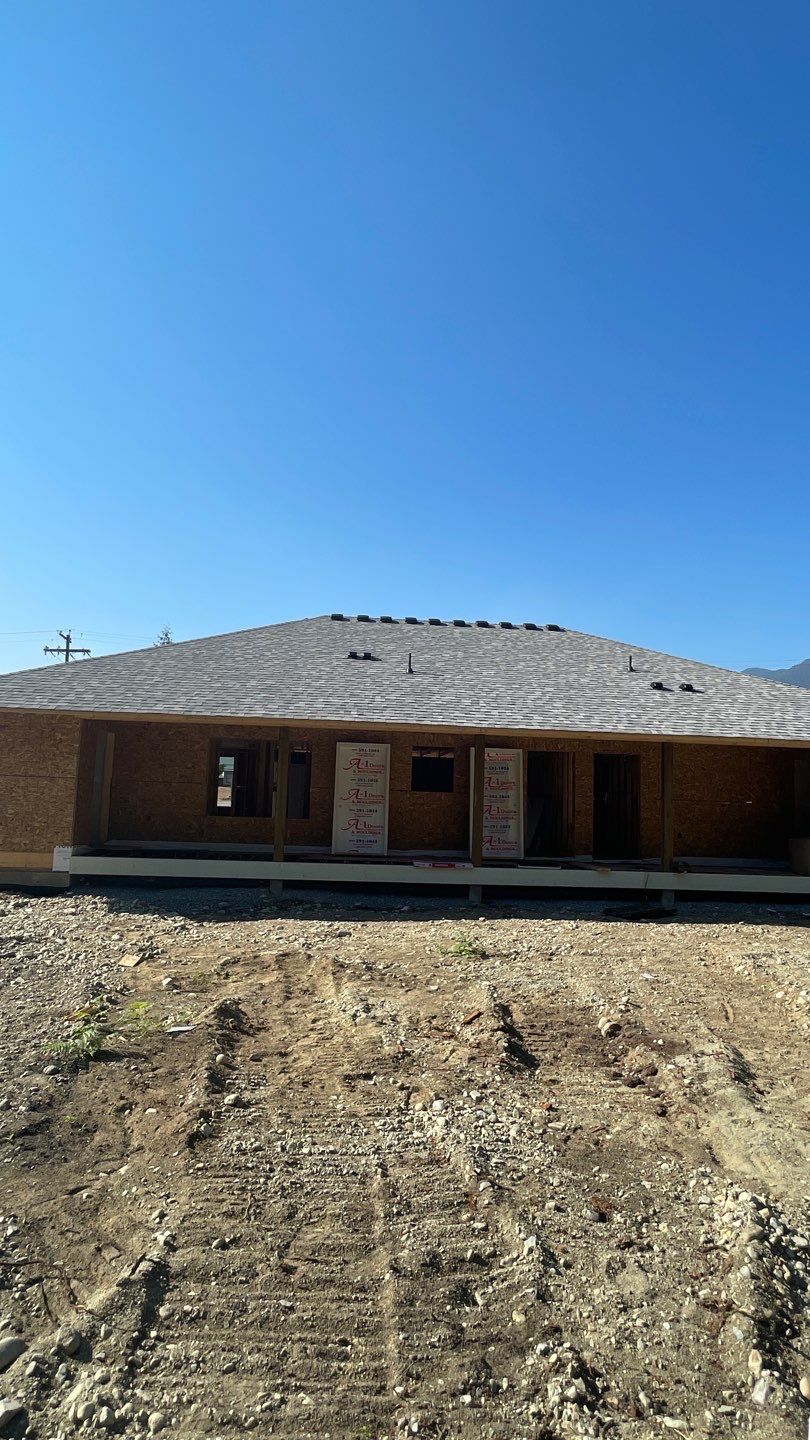 Residential Roofing Installation using OC Oakridge shingles by Top Notch Roofing Inc