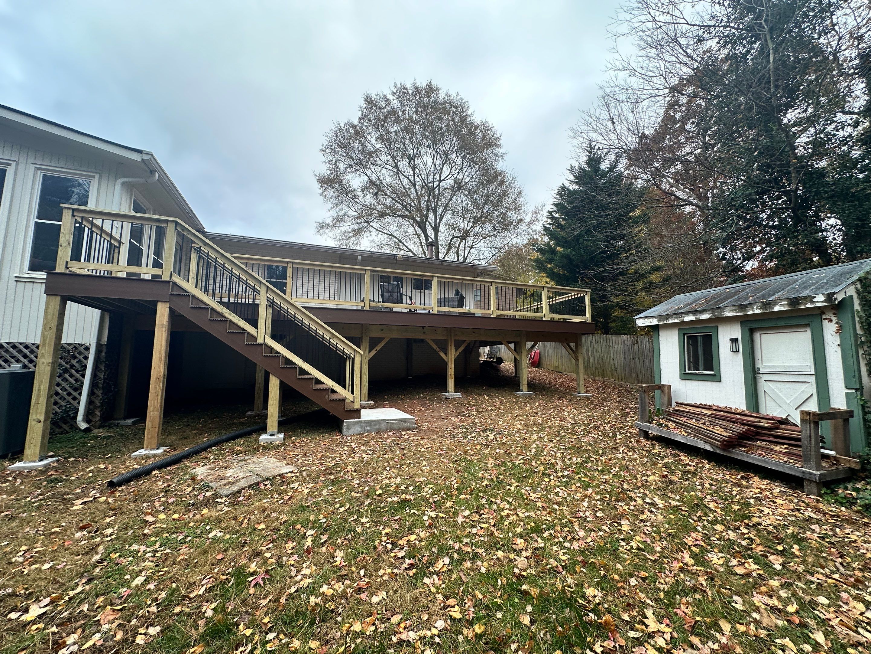 Elevated Composite Deck Rebuild With Metal Balusters in Marietta by Swift Home Renovations