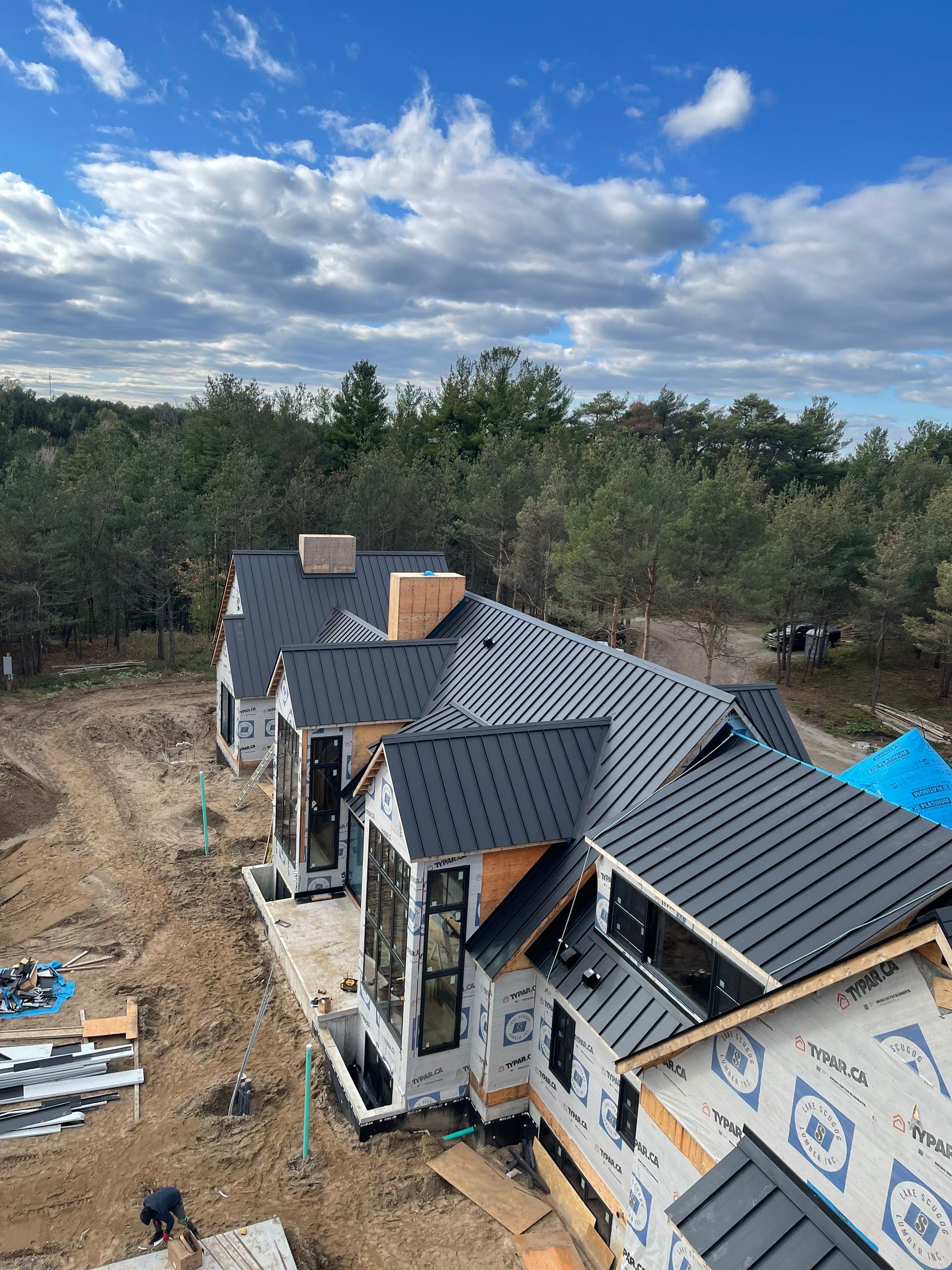 New Home Construction using 16" Standing Seam Panels by Jay Carter Roofing & Sheet Metal