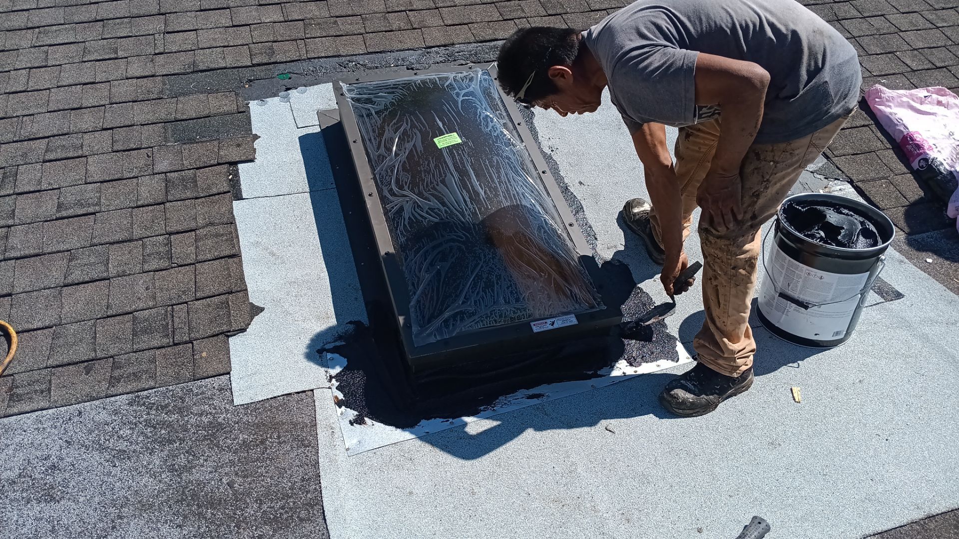REPLACE NON APPROVED SKYLIGHT ALONG WITH CLOGED GUTTER by Morton Roofing, Inc.