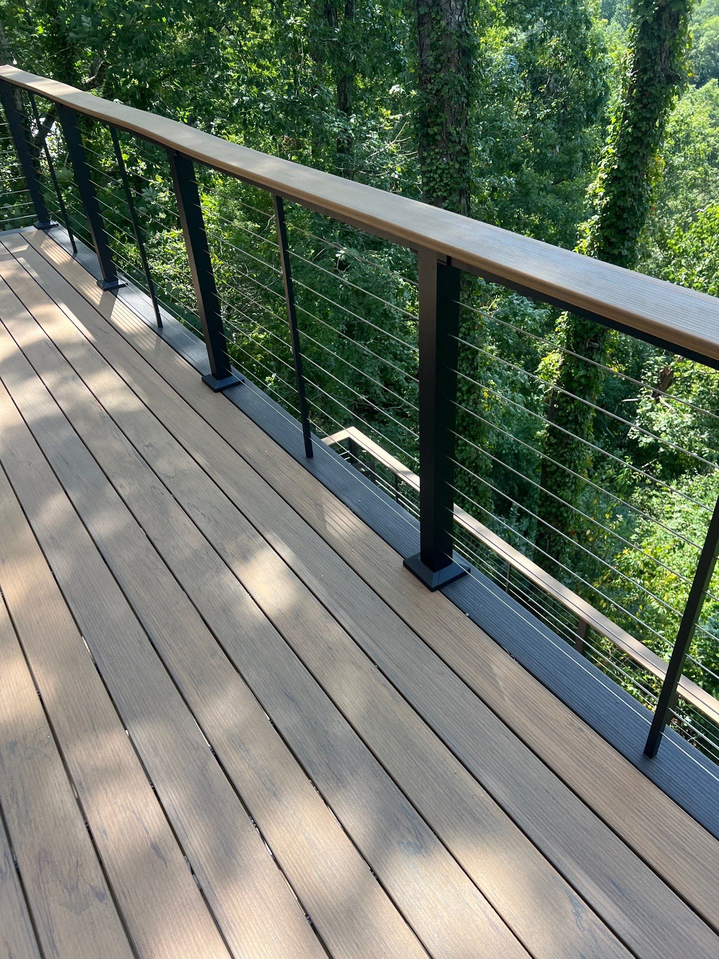 TimberTech Deck Replacement with Metal Cable Railing in Atlanta, GA by Nelson Exteriors