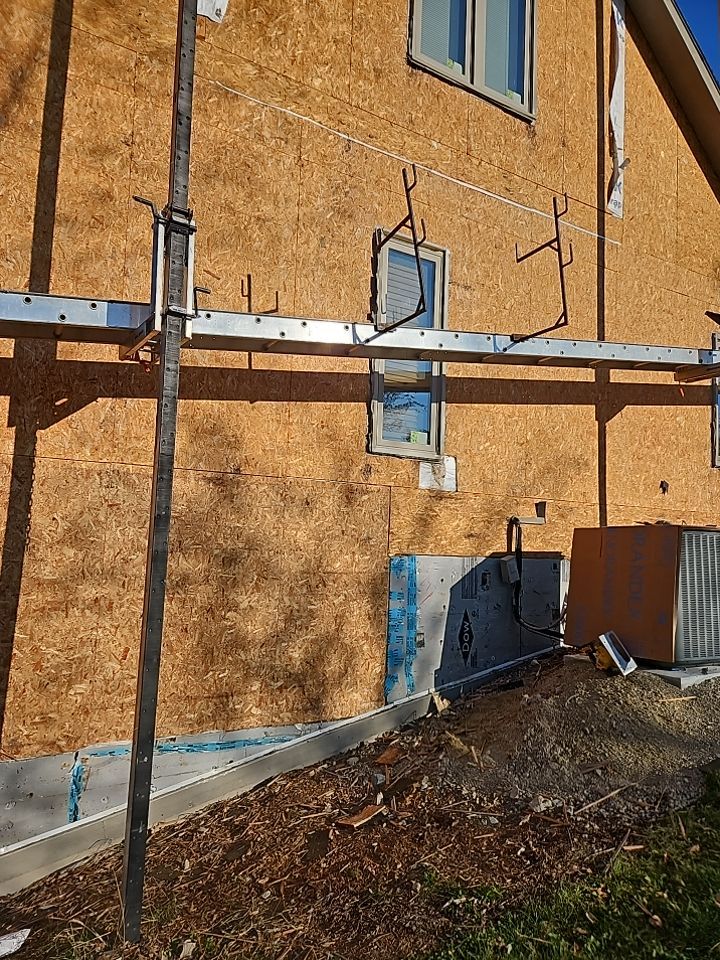 Siding Installation using Norandex Polar Wall Plus Siding, Window Wraps by Total Exteriors