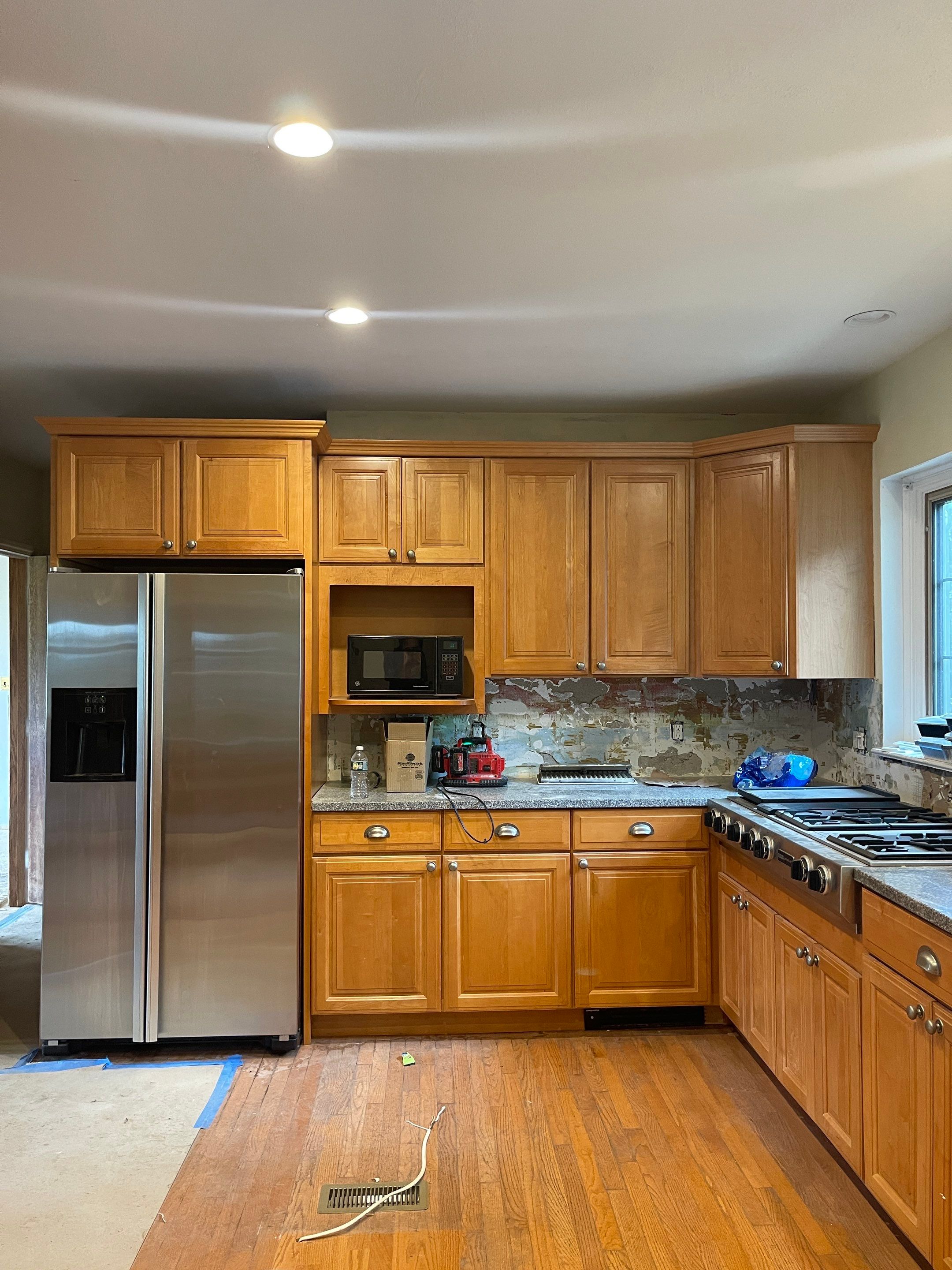 Kitchen Cabinet Painting using Milesi 2k by Trendy Walls Inc.