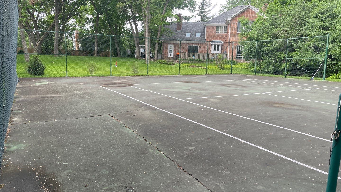 Tennis Court using Algaecide, soft wash soap by Northern Power Washing LLC.