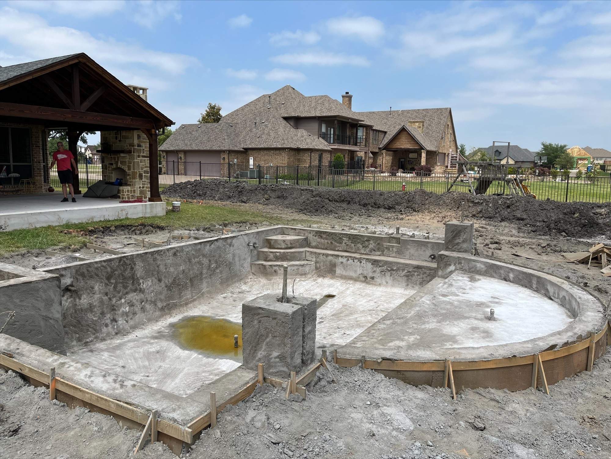 Freeform Pool and Spa with Travertine Decking and Bubblers by Pinnacle Pools and Spas - DFW
