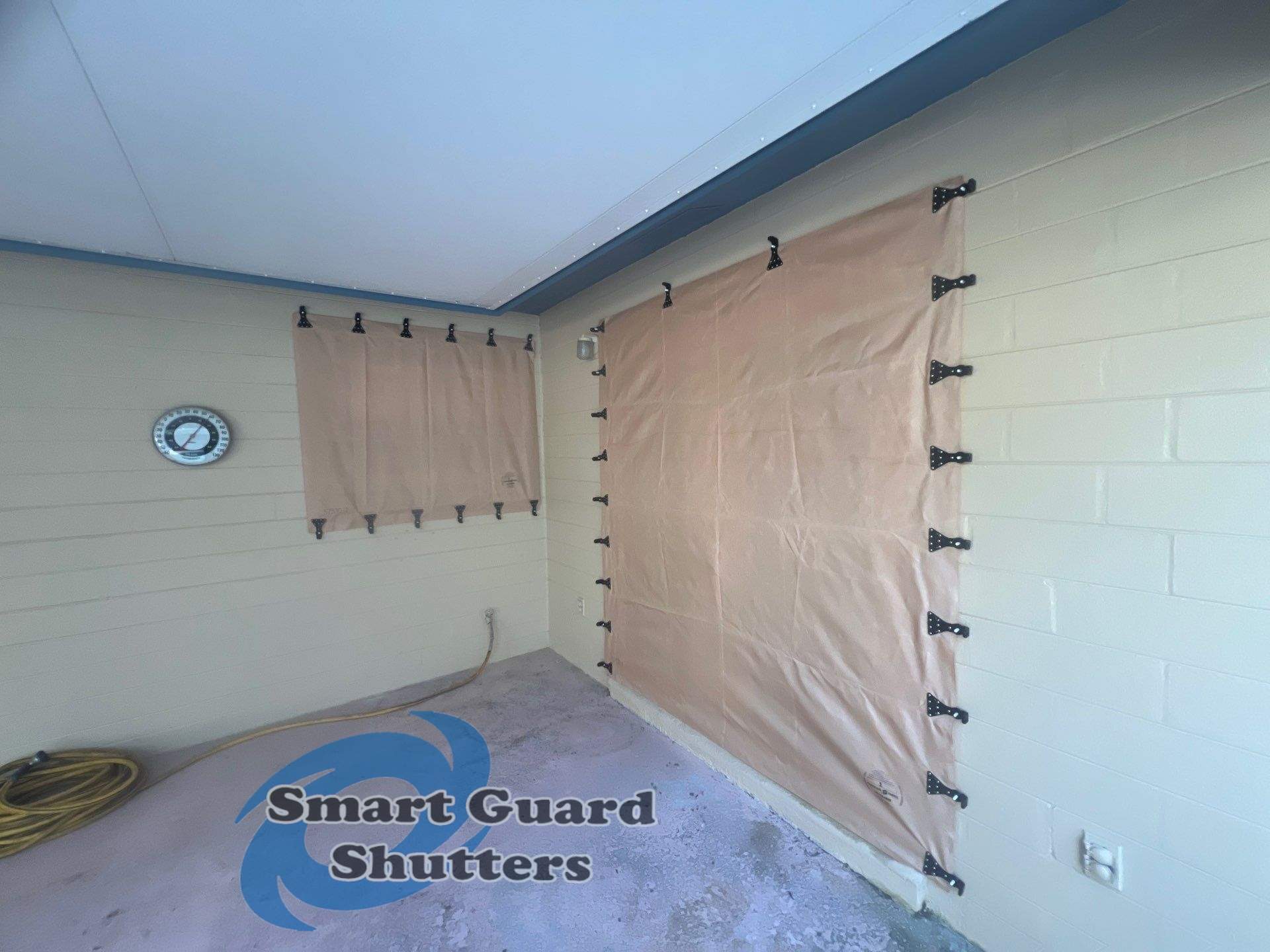 Hurricane Protection in Tan by Smart Guard Shutters