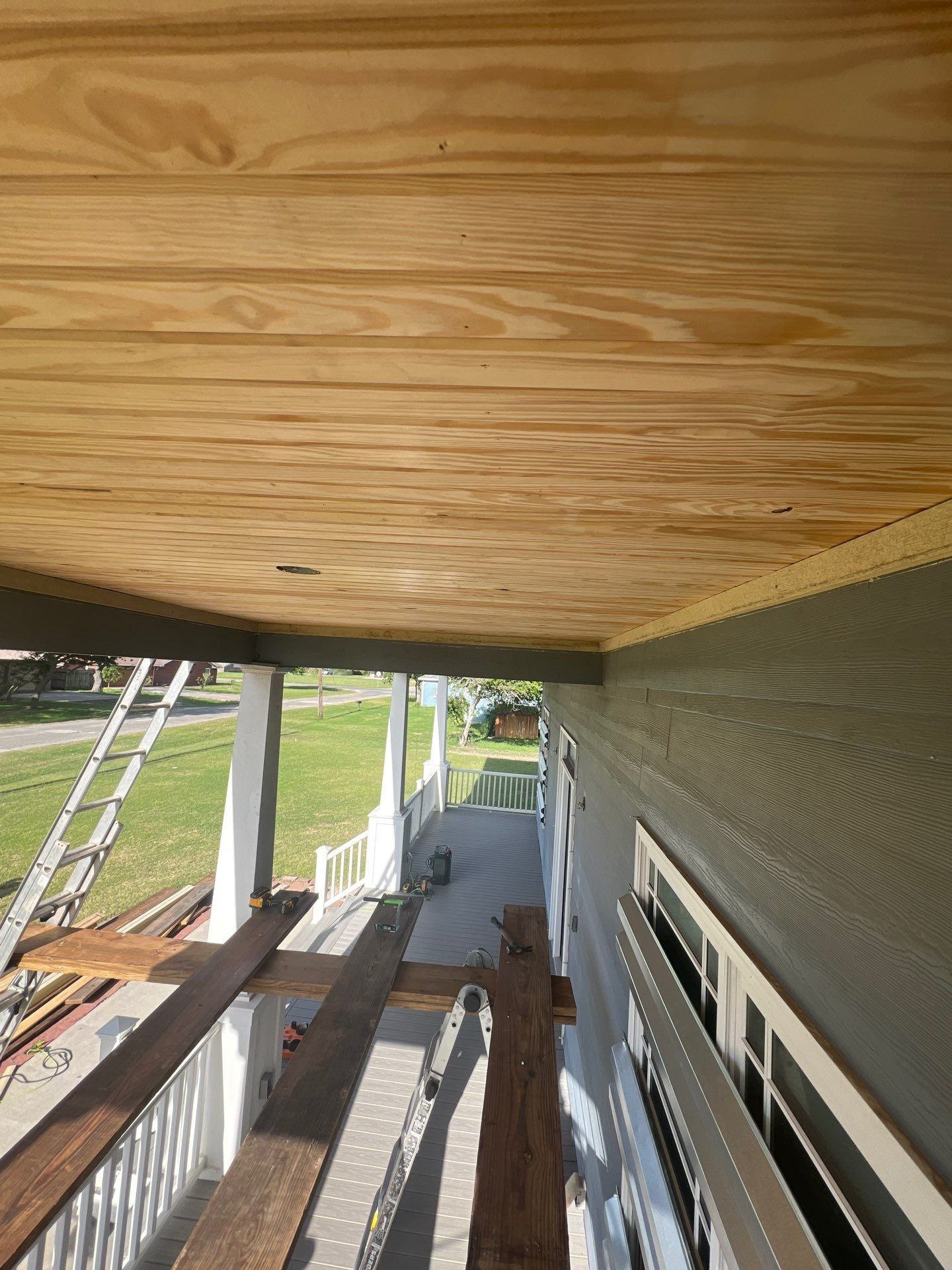 Patio? We got you Covered! by Bayfront Roofing and Construction