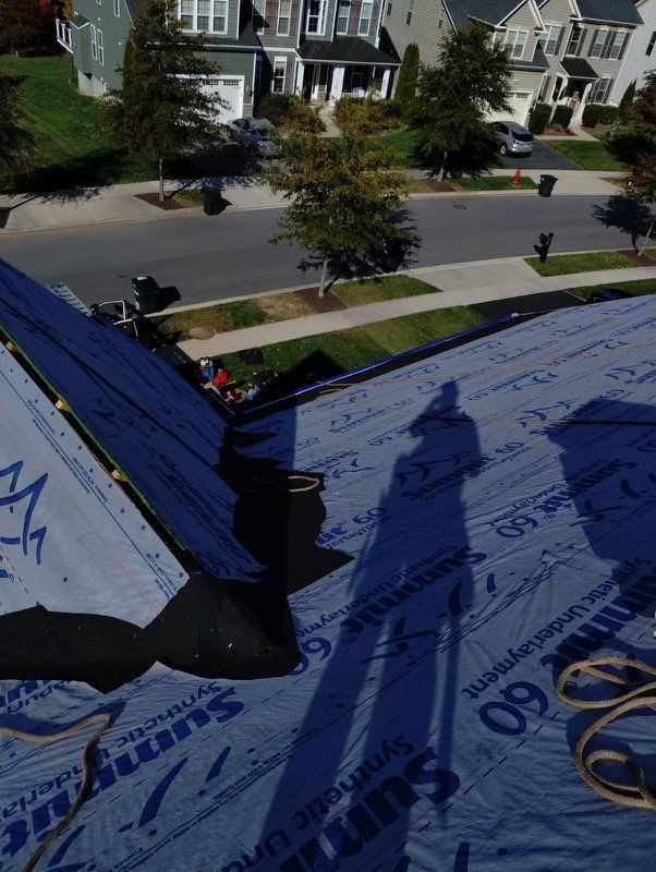 Residential Roofing Installation using Atlas Pinnacle Pristine Black Architectural Shingles by Frederick Roof Repair