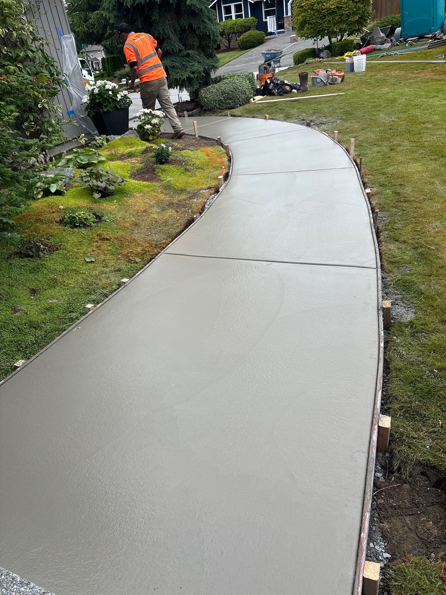 Exposed Aggregate Concrete Driveway Makeover  by Jireh Asphalt & Concrete Inc 