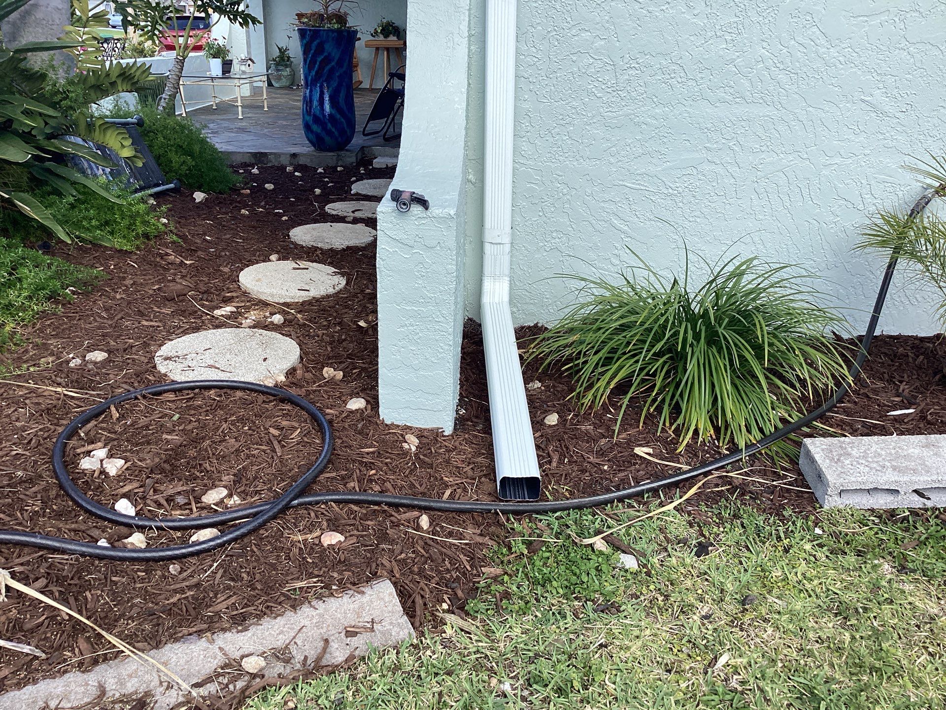 Downspout Installation using 3X4 Elbow Downspout in Cape Coral FL by Gutter Professors