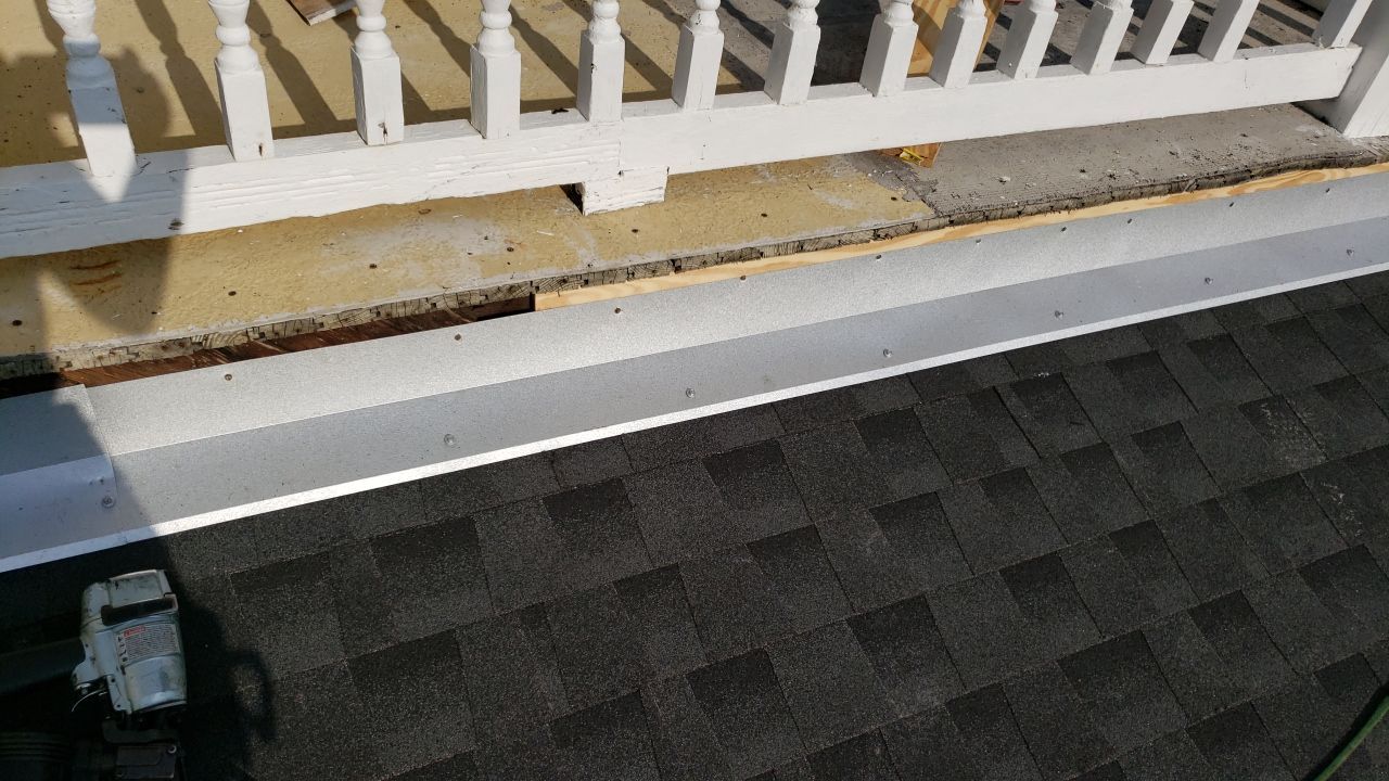 Residential Roofing Installation using Roof Replacement by American Roofing & Construction LLC