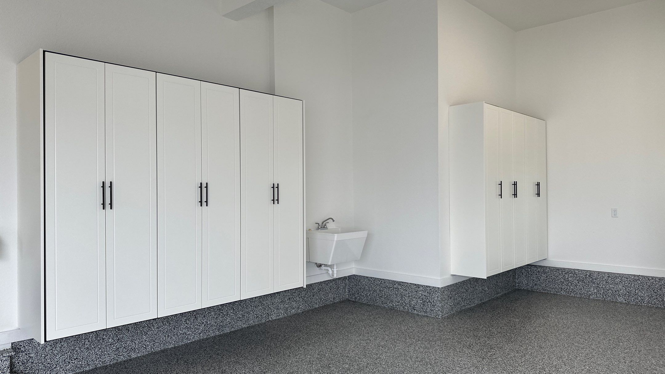 Mike & Pam transformed their garage with a Banner Garage Floor and Cabinets by Banner Garage