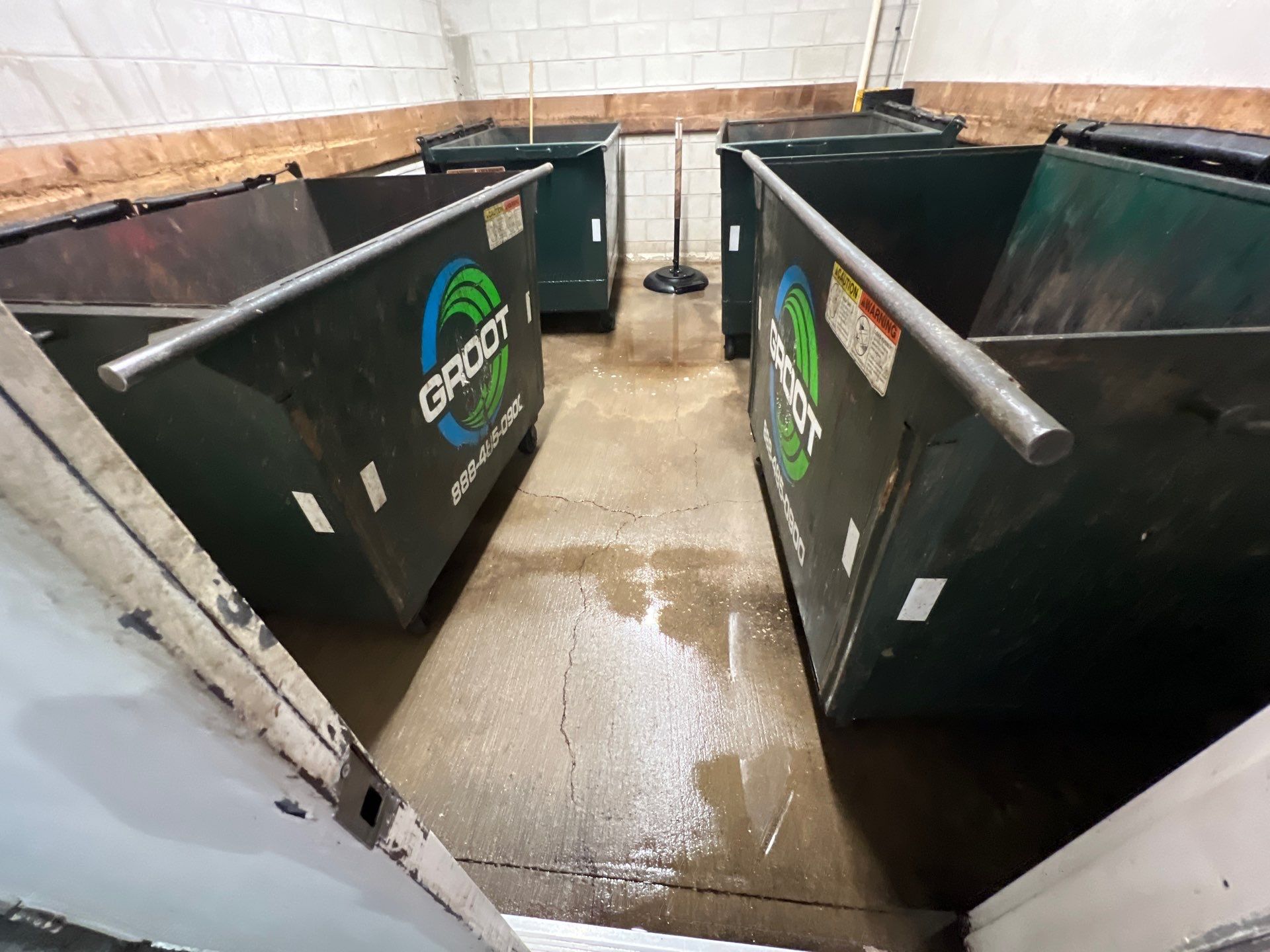 Parking garage using Hot water by Northern Power Washing LLC.