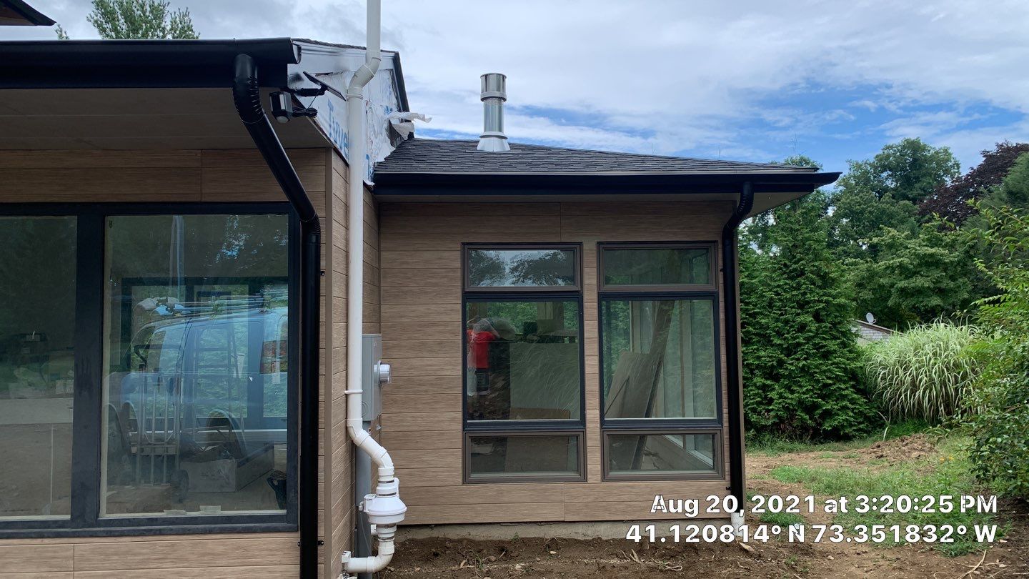 Black Gutters in wesport by A Plus Exterior