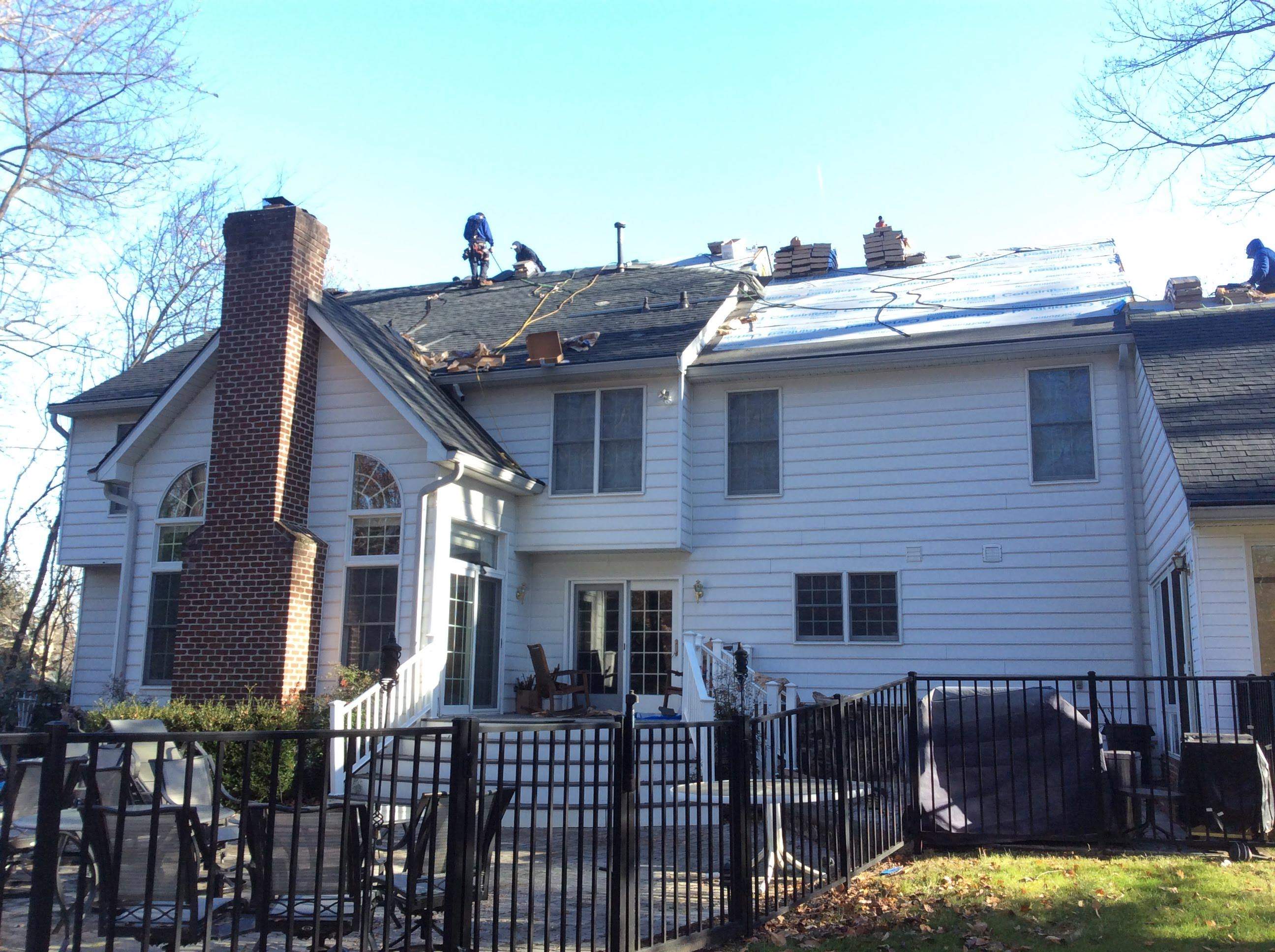 Residential Roofing Installation using Charcoal Black by Alpha Design Services