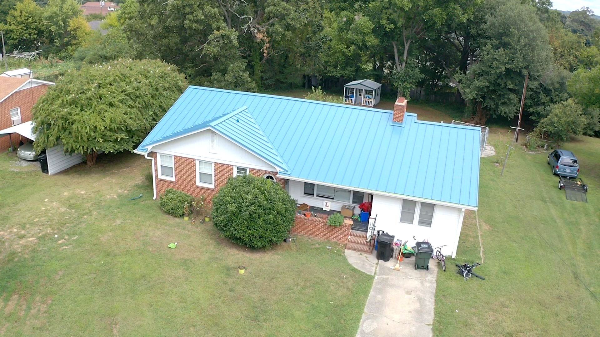 Carolina Blue Standing Seam Roof by Just In Time Roofing and Restoration