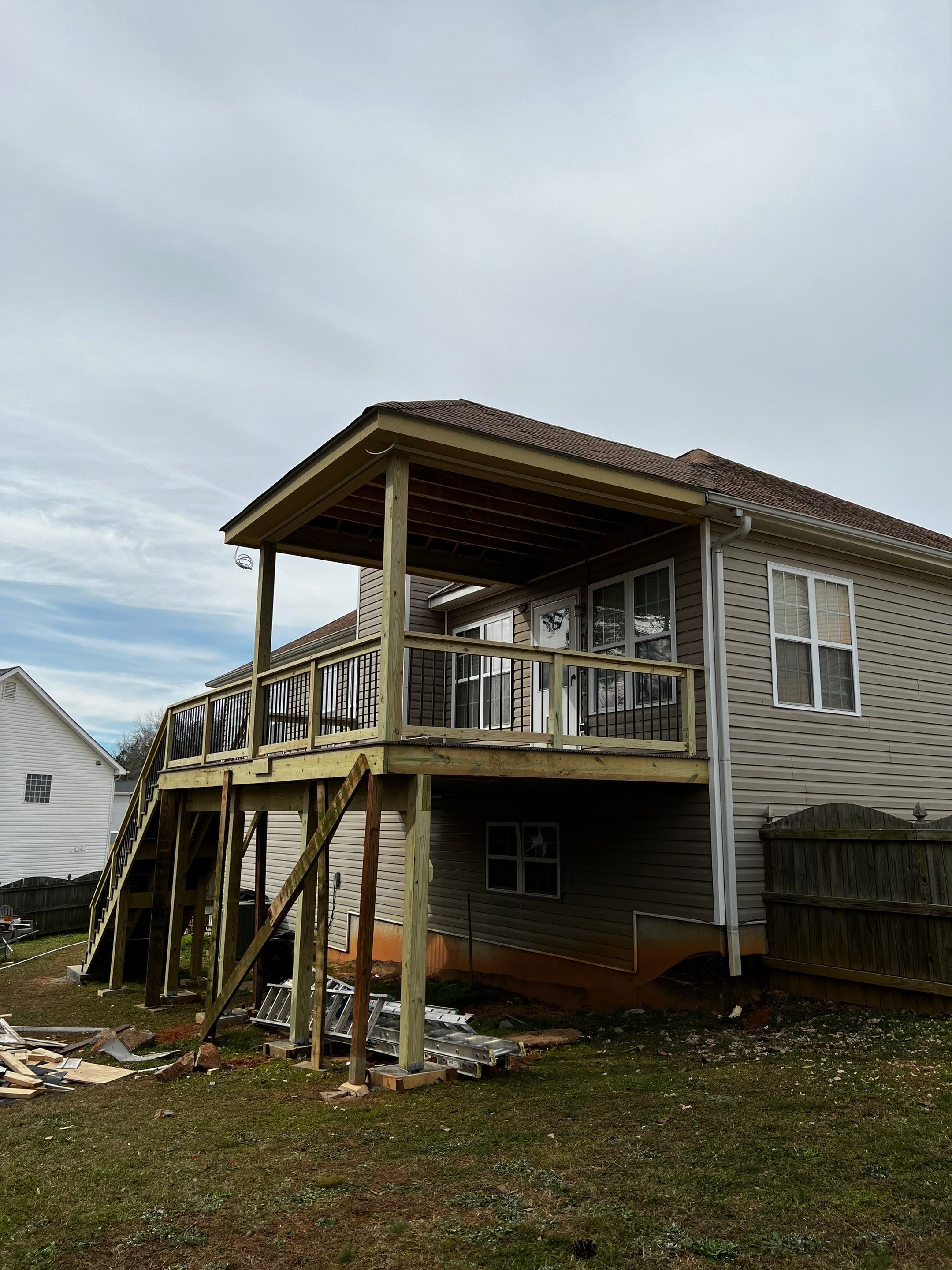 Custom Elevated Deck and Covered Porch Addition in Douglasville by Swift Home Renovations