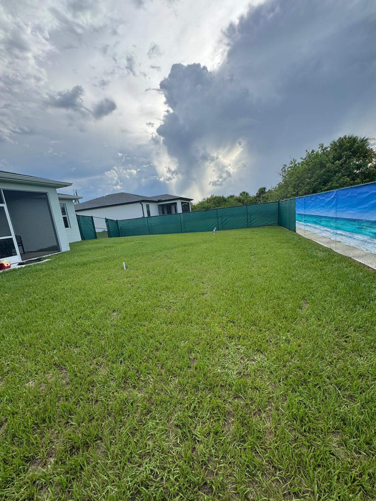 Chain Link Fence Installation with Custom Beach Privacy Screen in Port Charlotte by True Fence LLC
