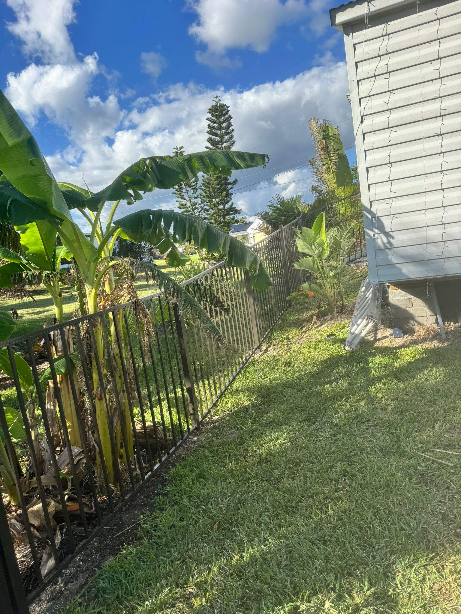Bronze Aluminum Picket Fence Installation in Port Charlotte by True Fence LLC