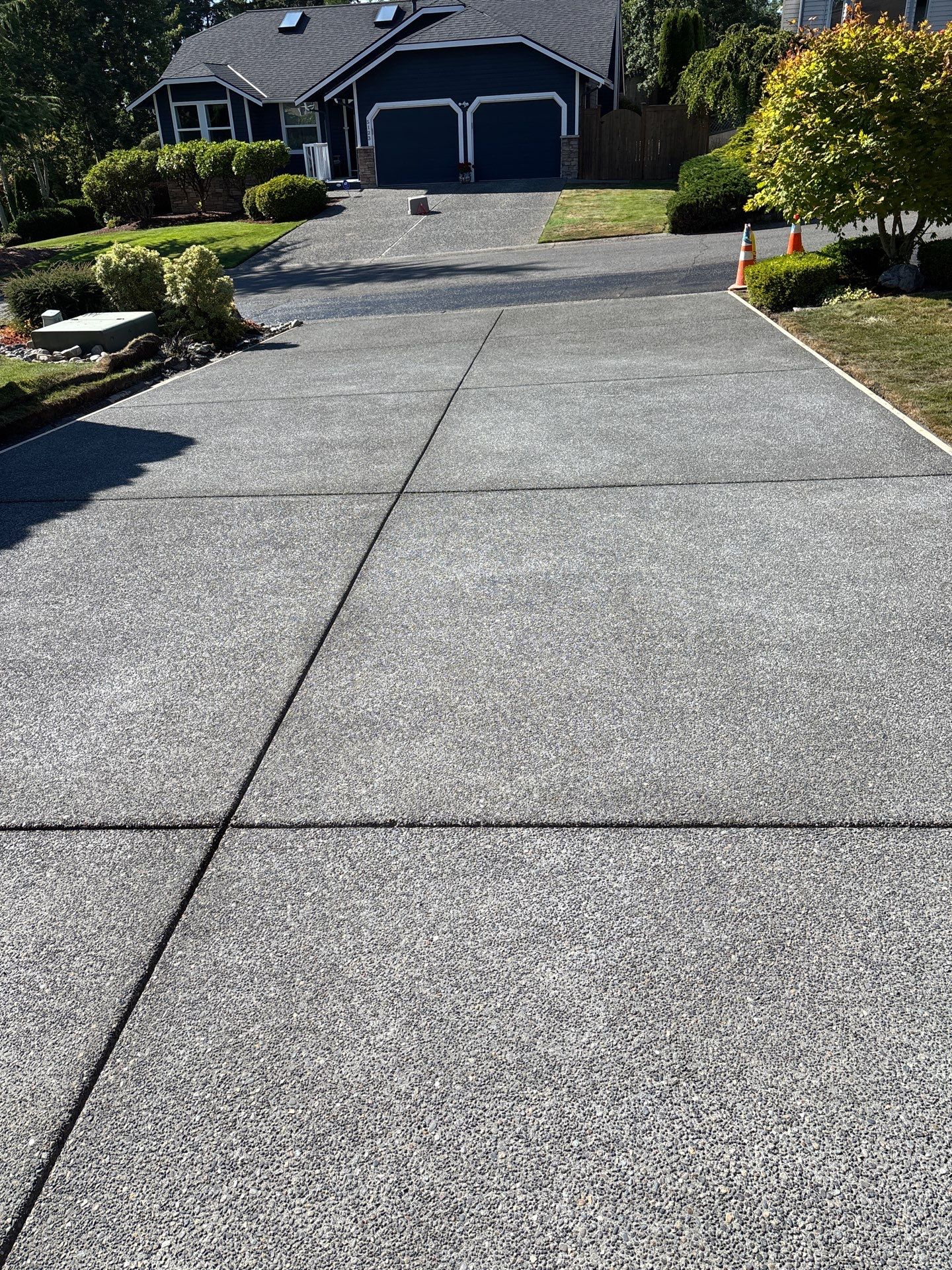 Exposed Aggregate Concrete Driveway Makeover  by Jireh Asphalt & Concrete Inc 