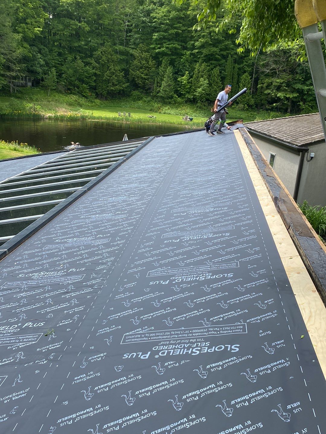 Roof Replacement using 16" Standing Seam Panels by Jay Carter Roofing & Sheet Metal
