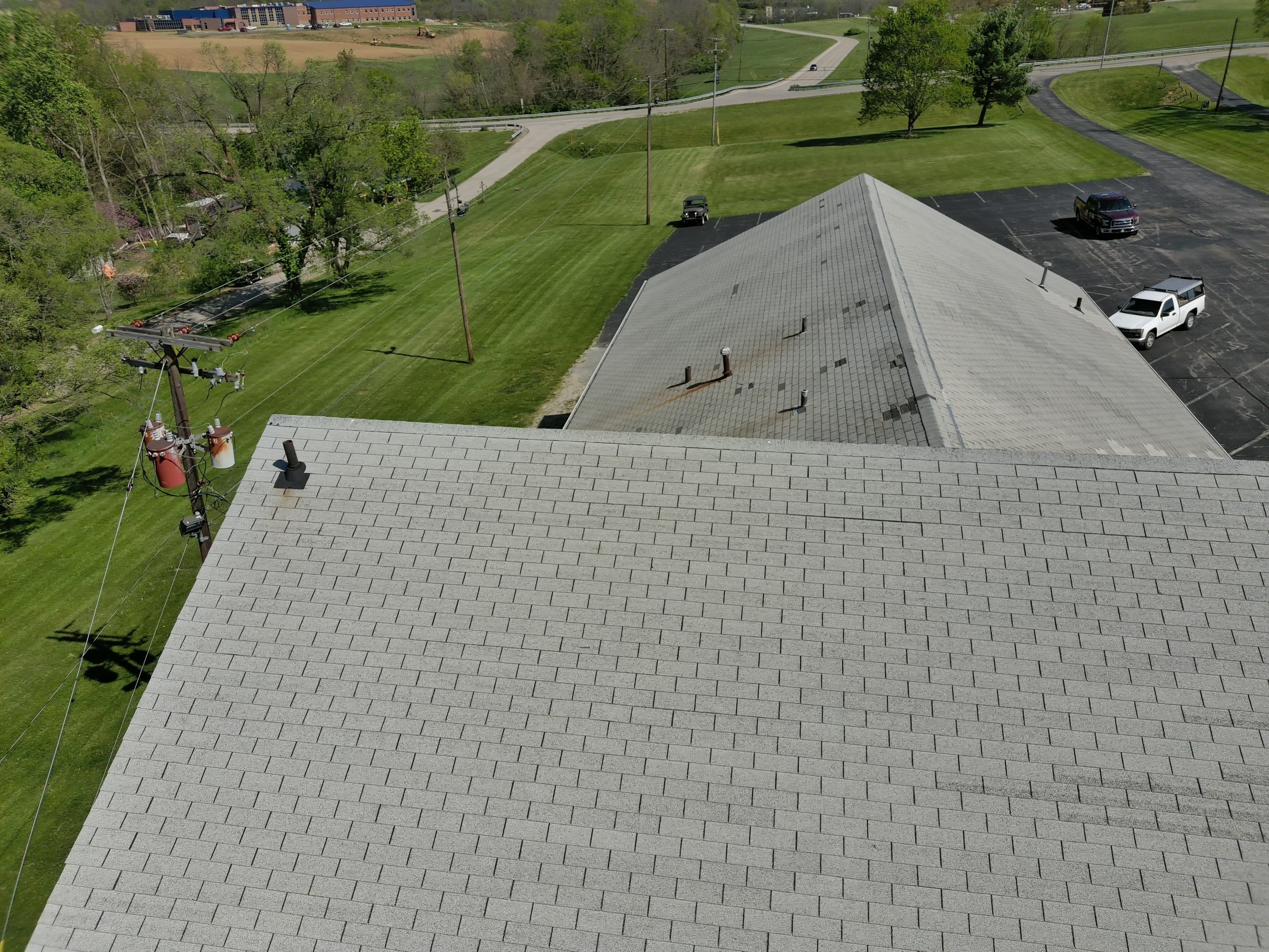 Commercial Roofing Installation using Performance Shingles by Mr. Roofer
