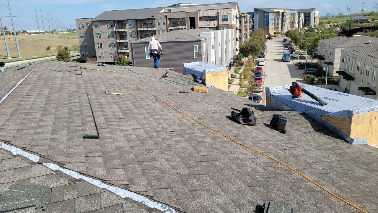 Apartment Roofing Installation using GAF HDZ Shingles, GAF TPO and Pavers in Lewisville, TX by Roof Experts