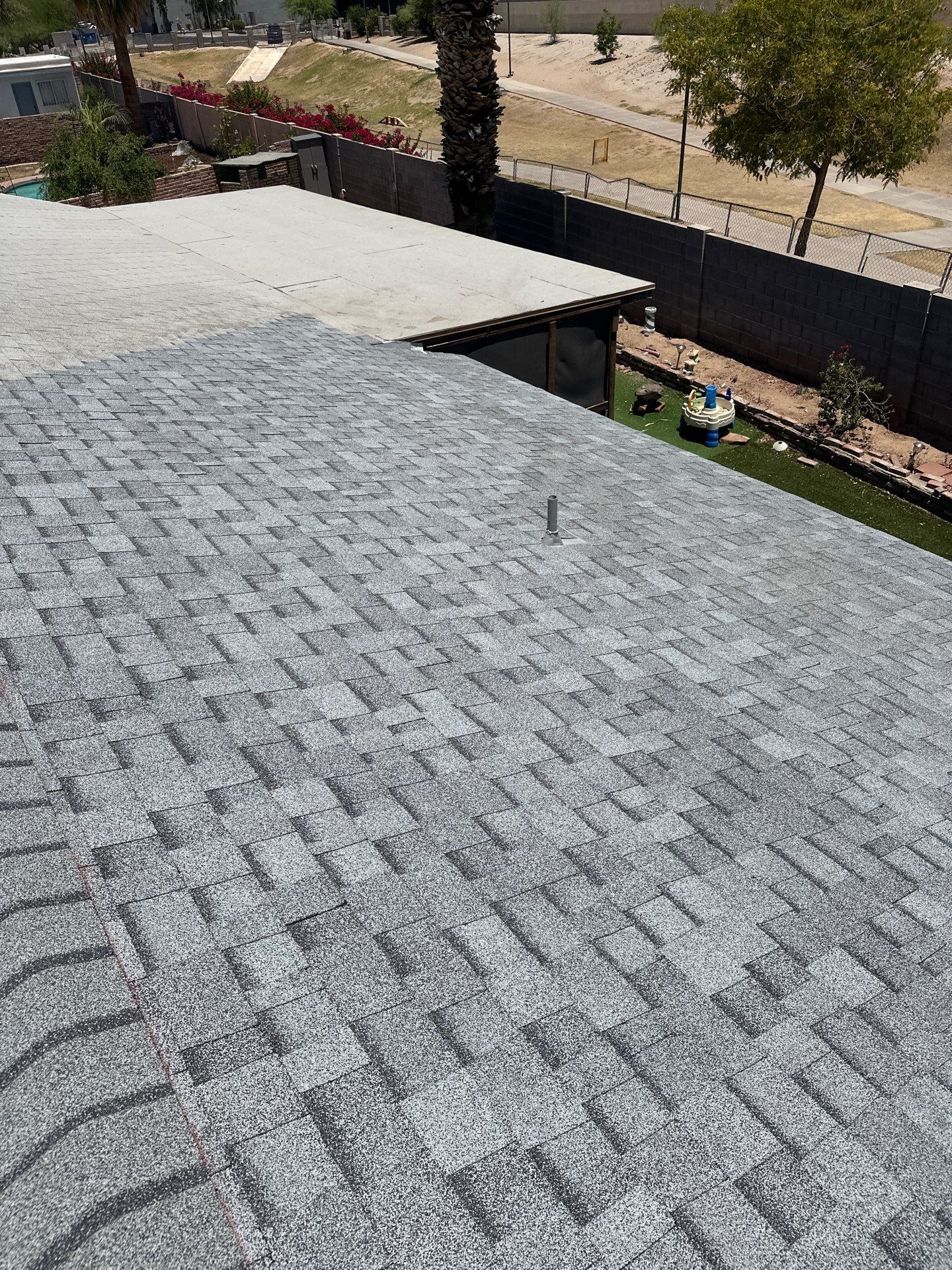 Estate Gray Shingles by Reimagine Roofing