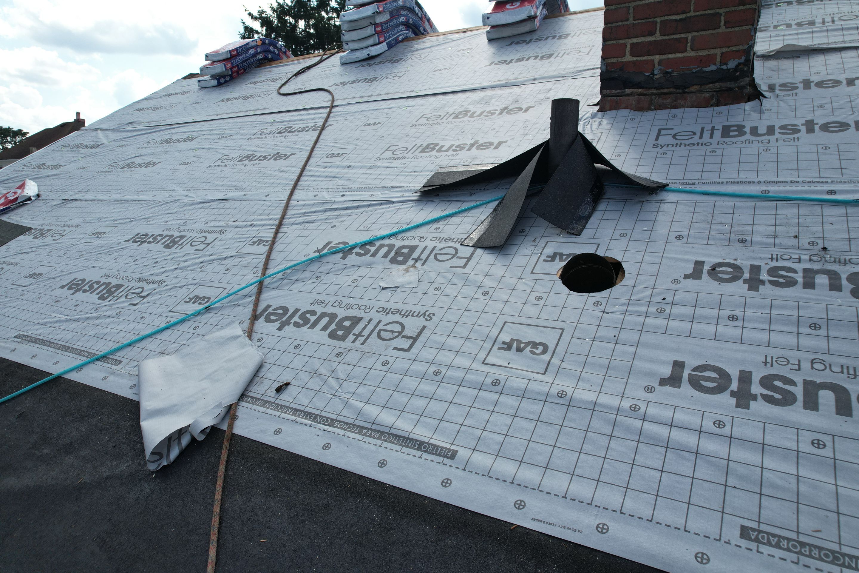 Residential Roofing Installation using GAF Timberline HDZ Williamsburg Slate by Rainstoppers Roofing