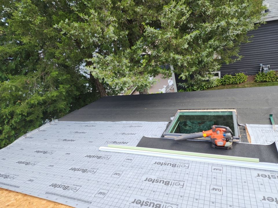 Residential Roof Installation and Skylight Replacement in Kiel, WI by Gellings Roofing & Siding